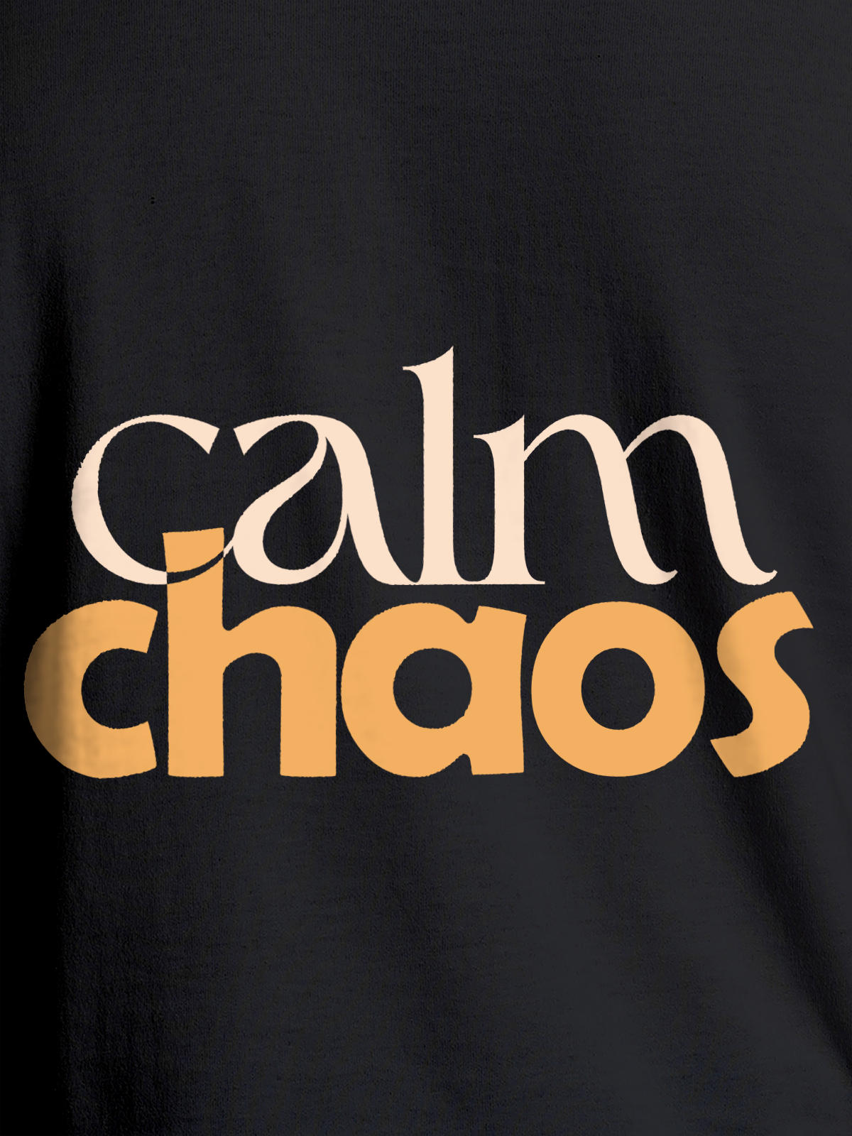 Close up of 'Calm Chaos' design on Women's Dark Grey Round Neck T-shirt, highlighting intricate details and vibrant print.