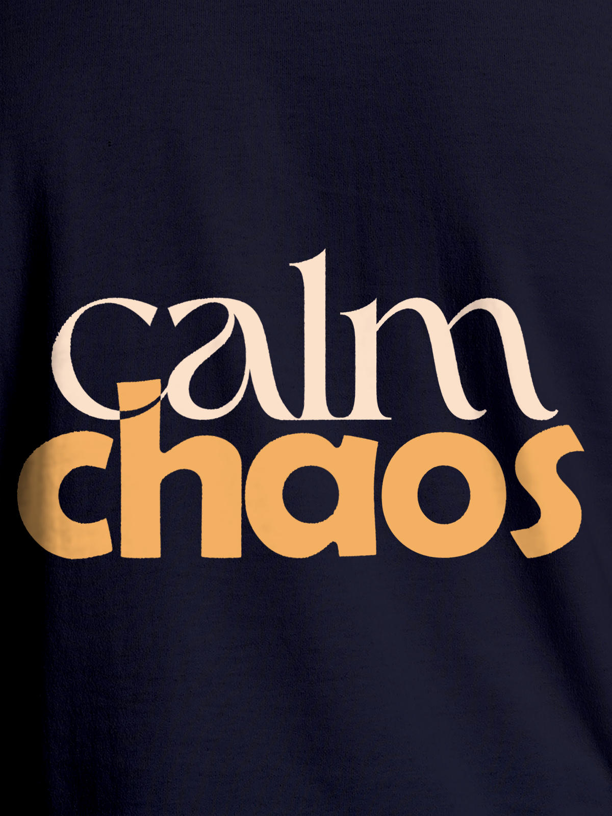 Close up of 'Calm Chaos' design on Women's Navy Blue Round Neck T-shirt, highlighting intricate details and vibrant print.