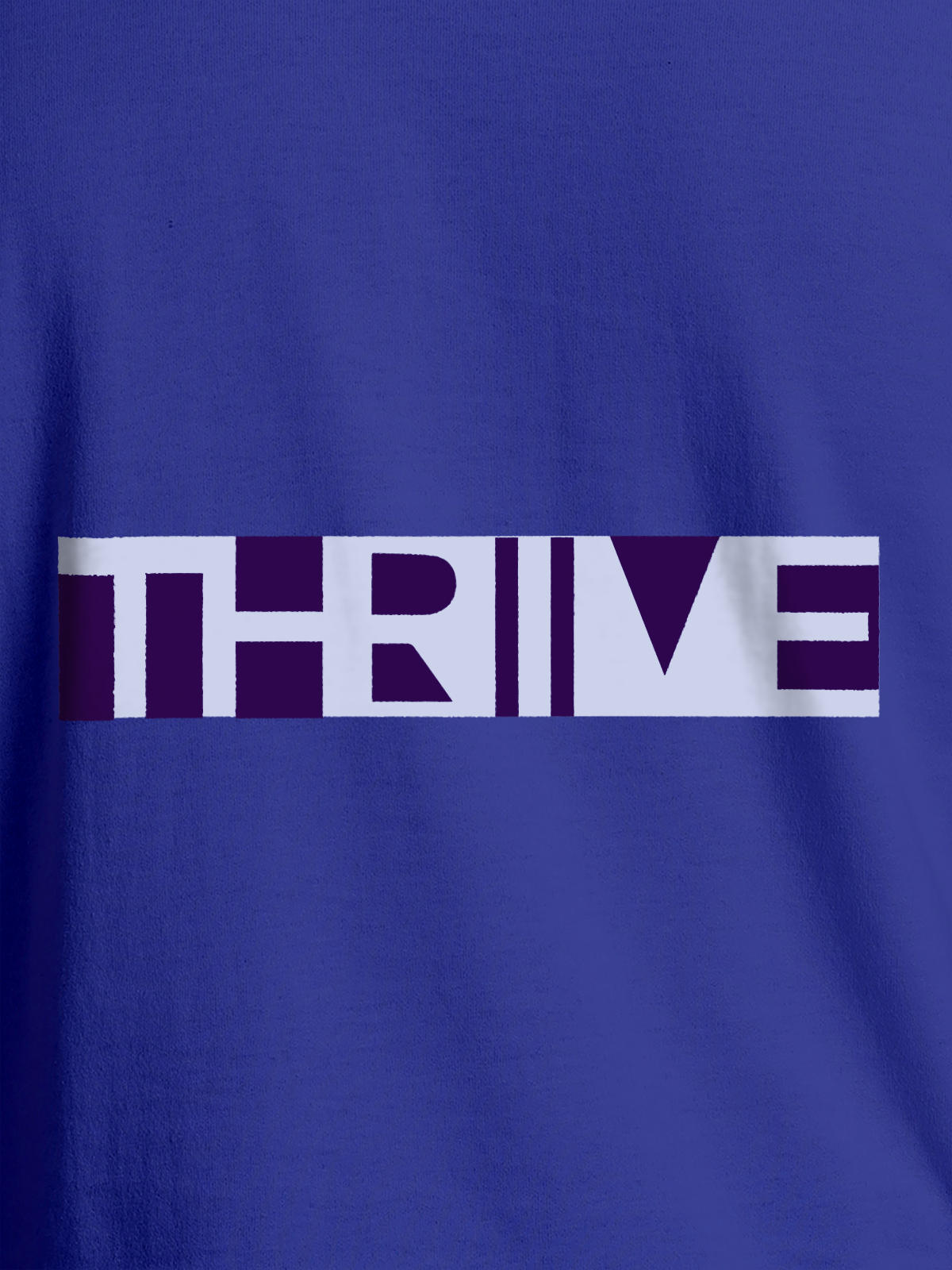 Close up of 'Thrive' design on Women's Blue Round Neck T-shirt, highlighting intricate details and vibrant print.