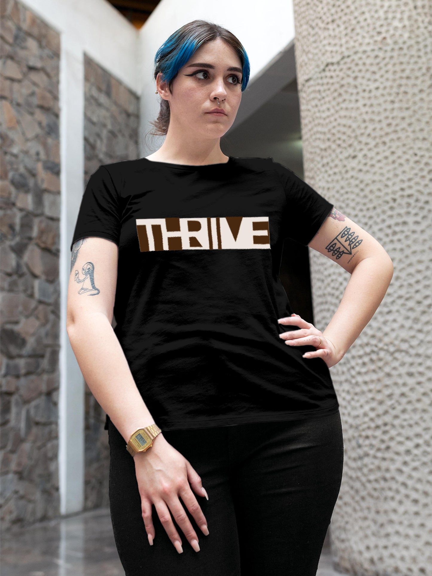 Model wearing Women's Black Round Neck T-shirt with 'Thrive' design, offering effortless style and premium comfort