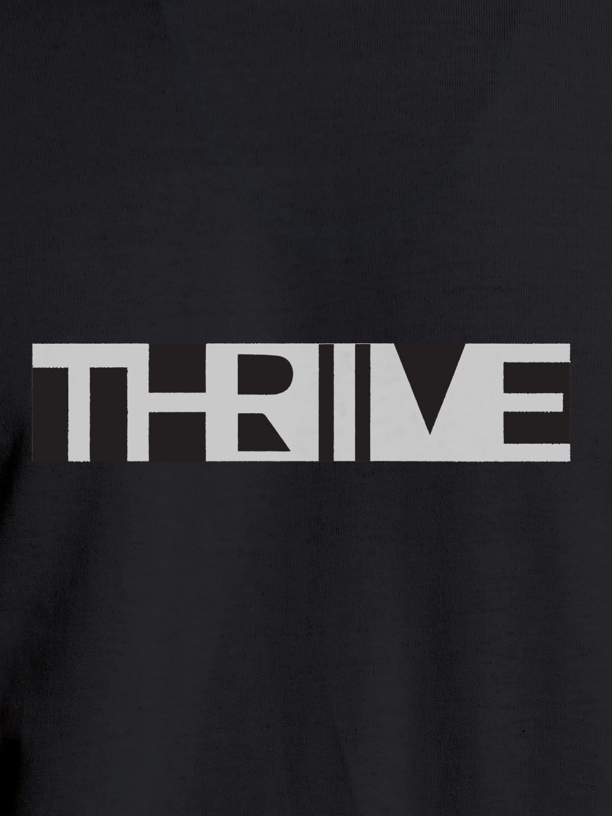Close up of 'Thrive' design on Men's Dark Grey Round Neck T-shirt, highlighting intricate details and vibrant print.