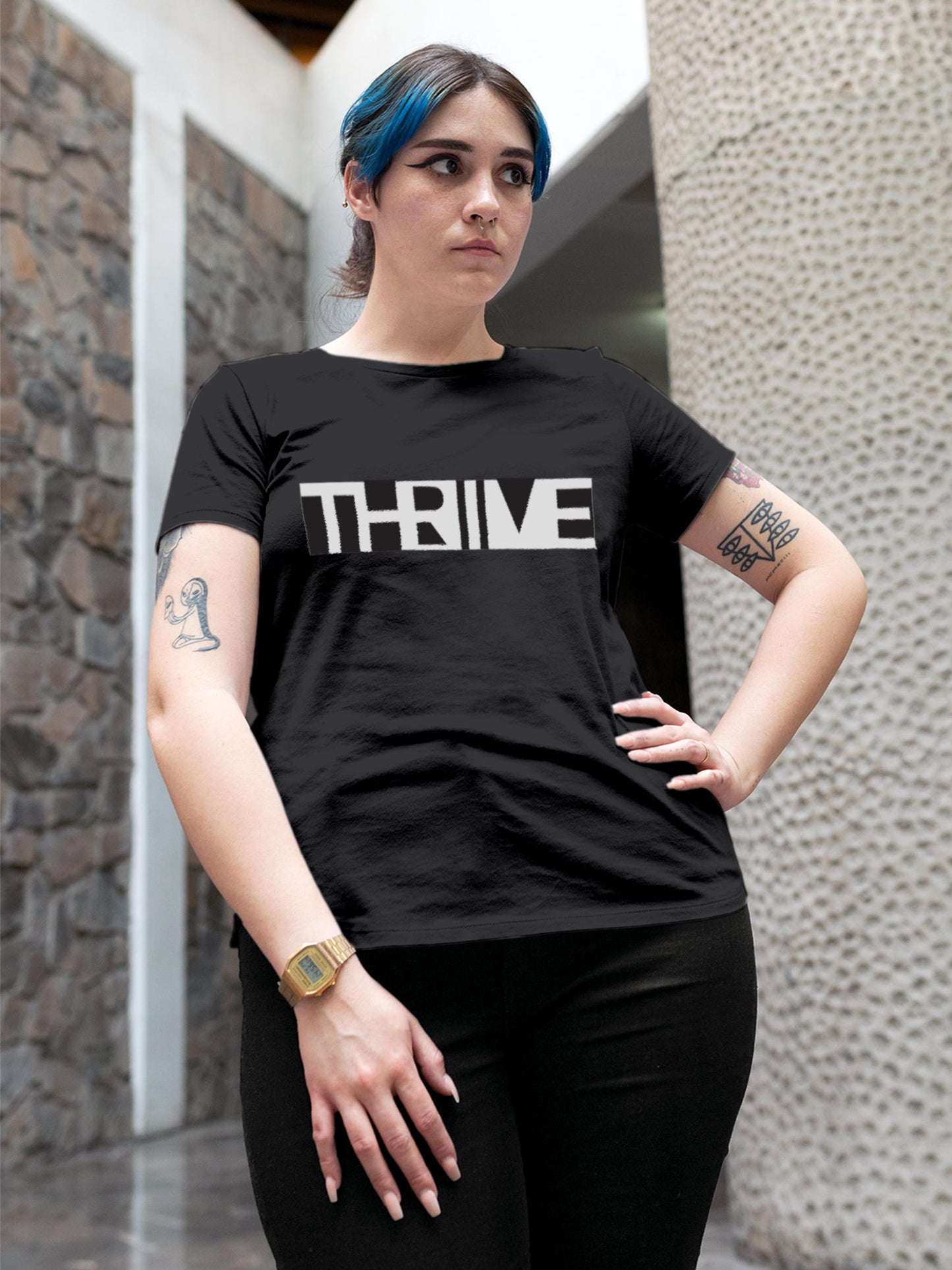 Model wearing Women's Dark Grey Round Neck T-shirt with 'Thrive' design, offering effortless style and premium comfort