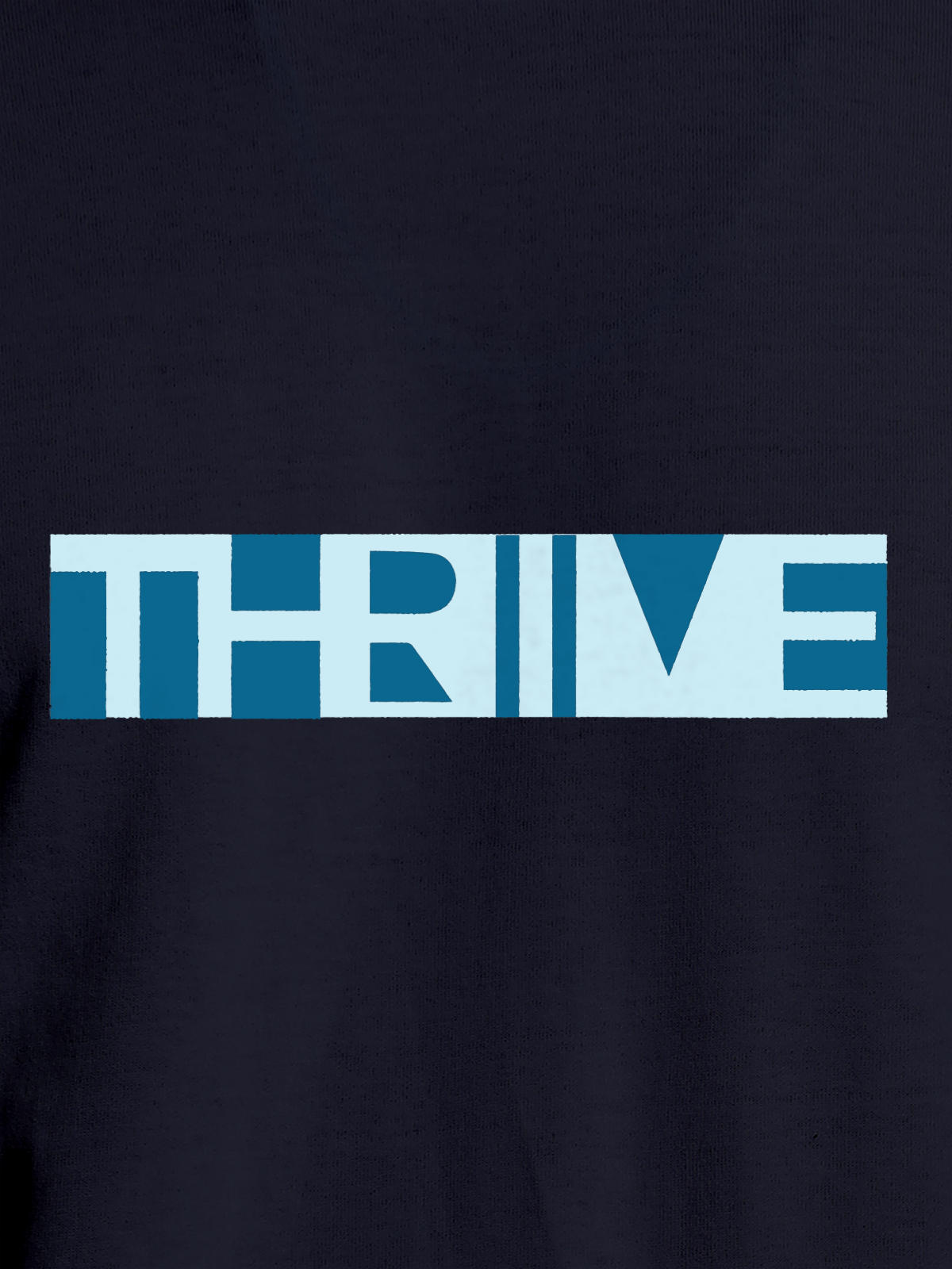 Close up of 'Thrive' design on Men's Navy Blue Round Neck T-shirt, highlighting intricate details and vibrant print.