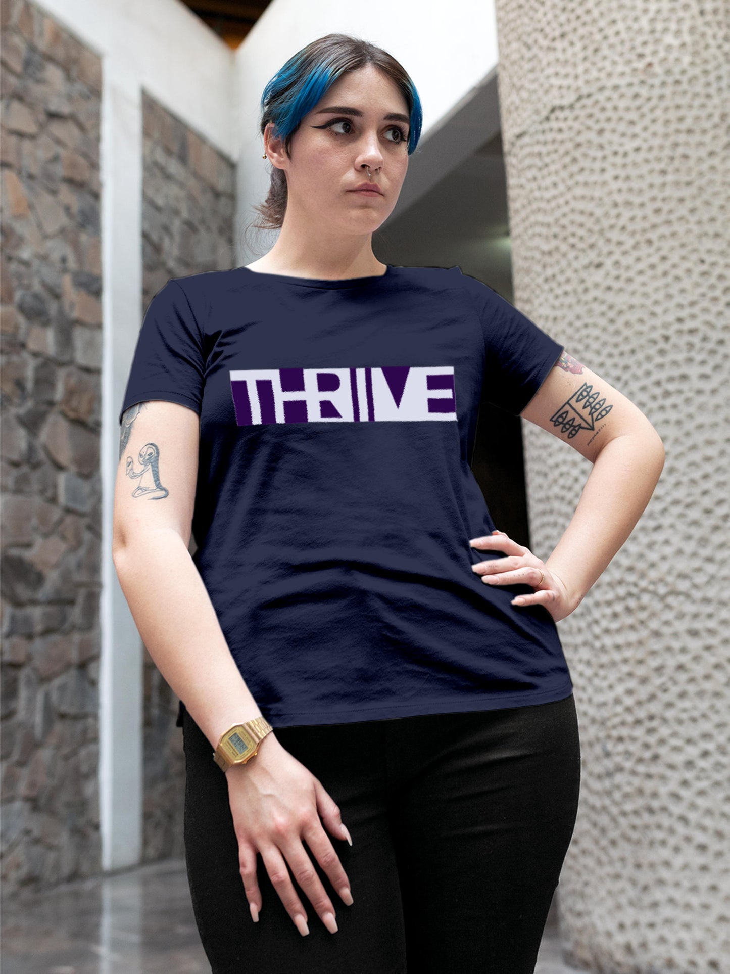 Model wearing Women's Navy Blue Round Neck T-shirt with 'Thrive' design, offering effortless style and premium comfort