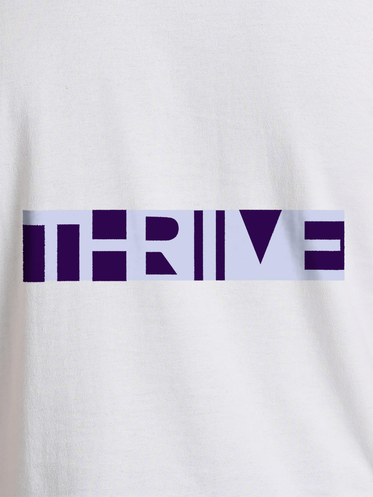 Close up of 'Thrive' design on Women's White Round Neck T-shirt, highlighting intricate details and vibrant print.