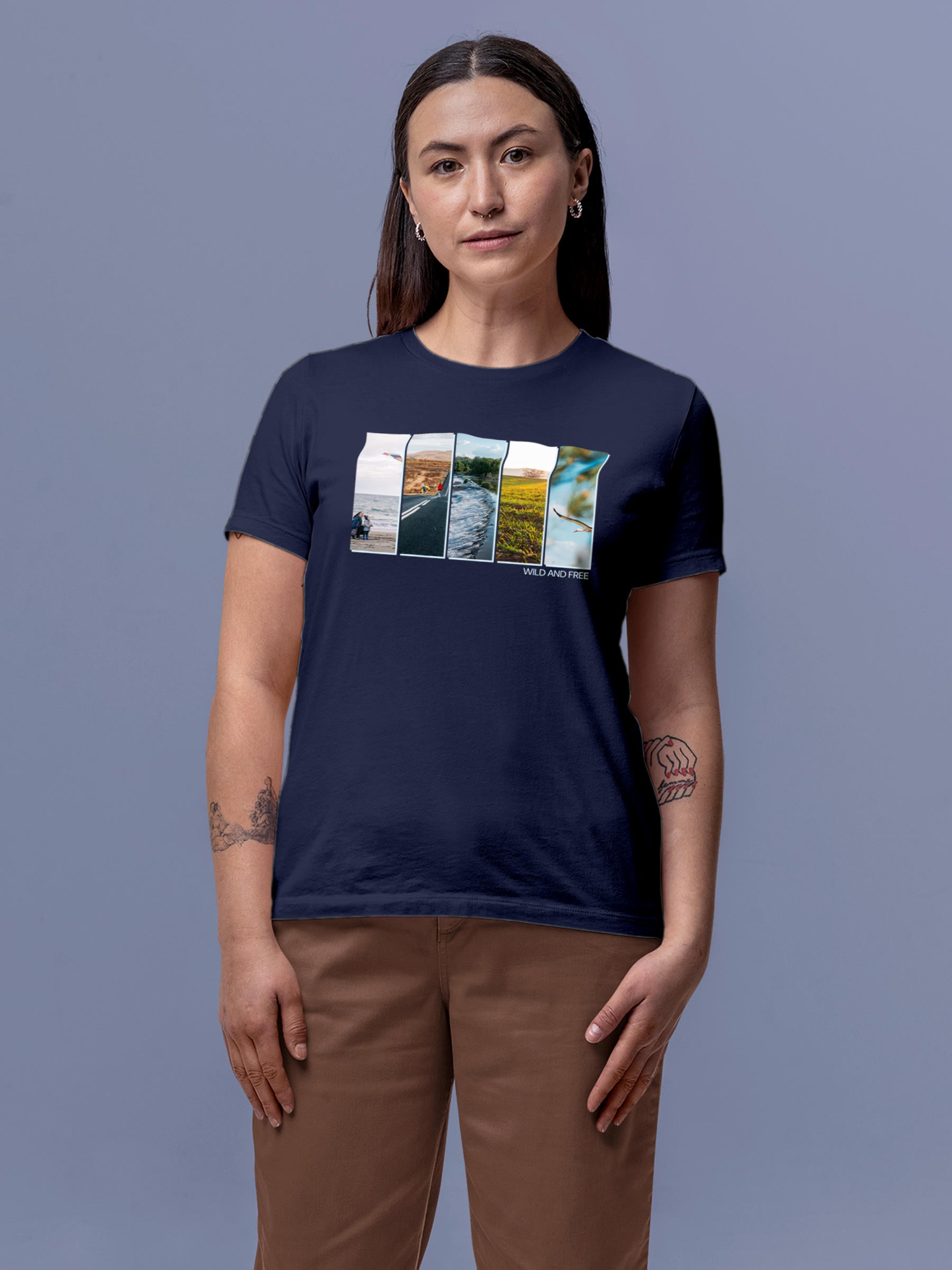 Model wearing Women's Navy Blue Round Neck T-shirt with 'Wild & Free' design, offering effortless style and premium comfort