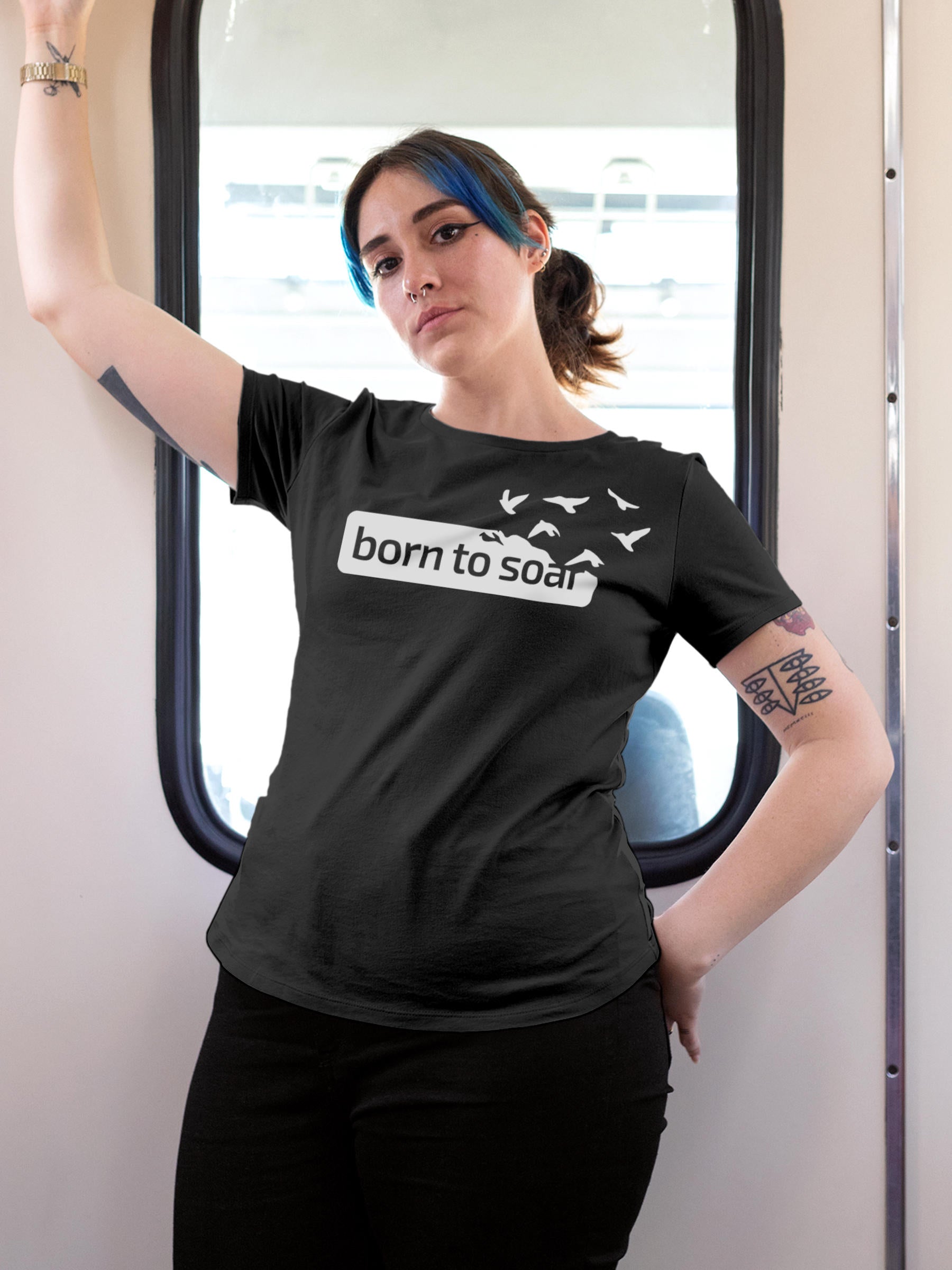 Model wearing Women's Dark Grey Round Neck T-shirt with 'Born To Soar' design, offering effortless style and premium comfort