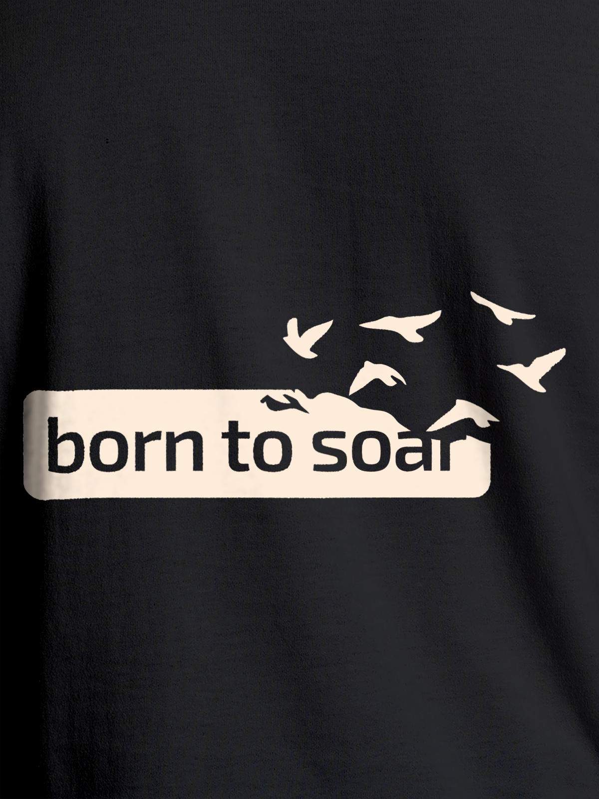 Close up of 'Born To Soar' design on Women's Dark Grey Round Neck T-shirt, highlighting intricate details and vibrant print.