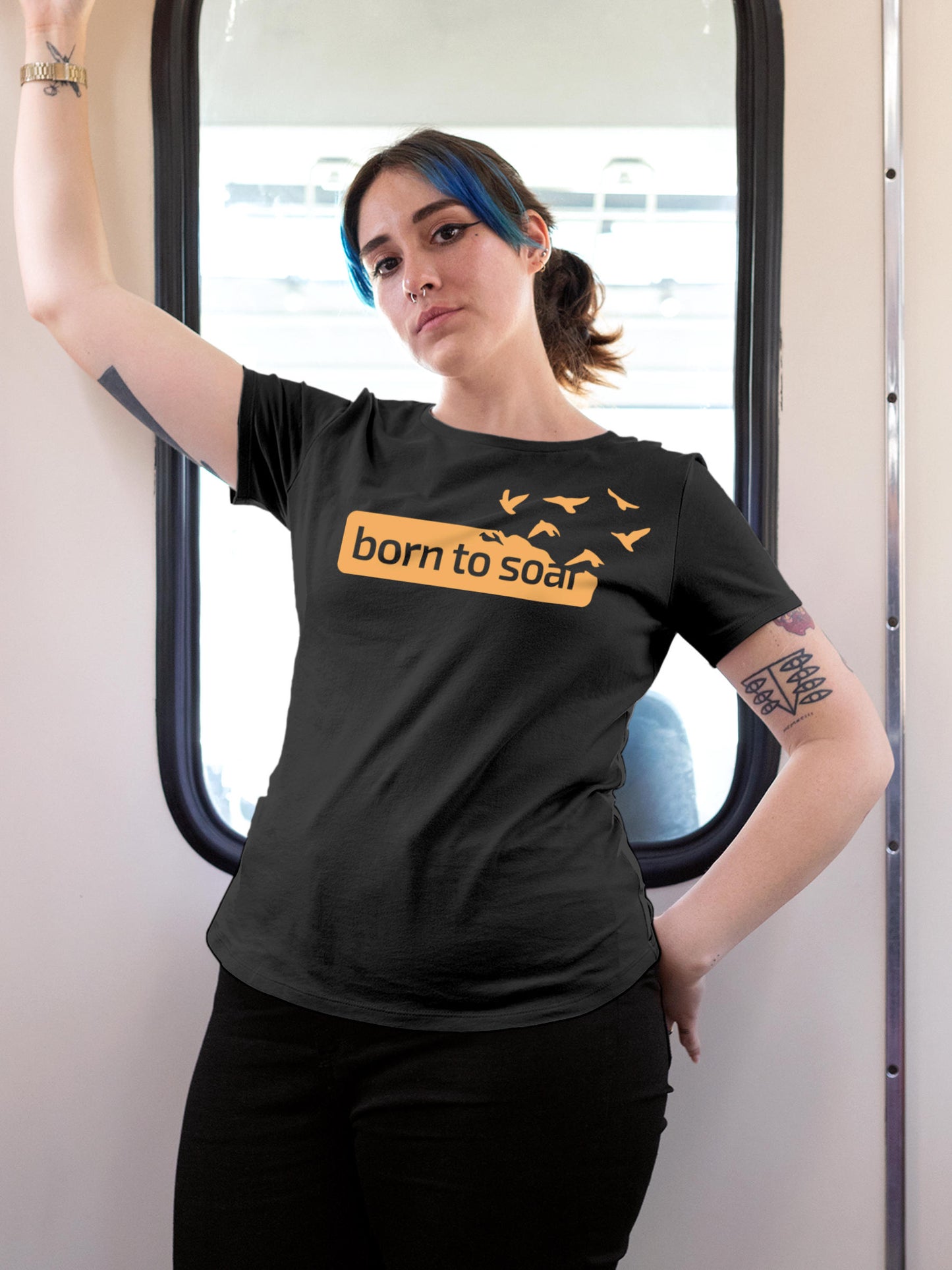 Model wearing Women's Dark Grey Round Neck T-shirt with 'Born To Soar' design, offering effortless style and premium comfort