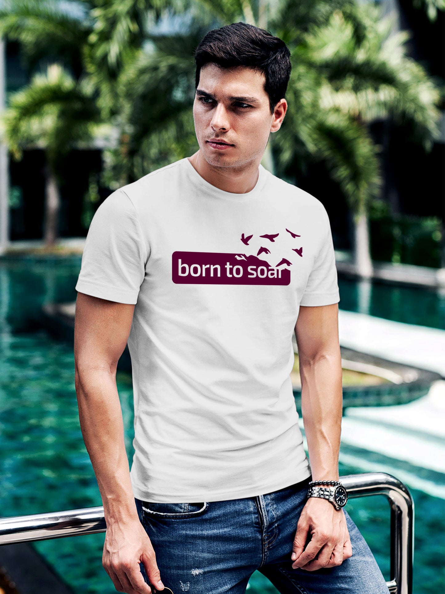 Model wearing Men's White Round Neck T-shirt with 'Born To Soar' design, offering effortless style and premium comfort