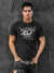 Model wearing Men's Dark Grey Round Neck T-shirt with 'Born Free' design, offering effortless style and premium comfort