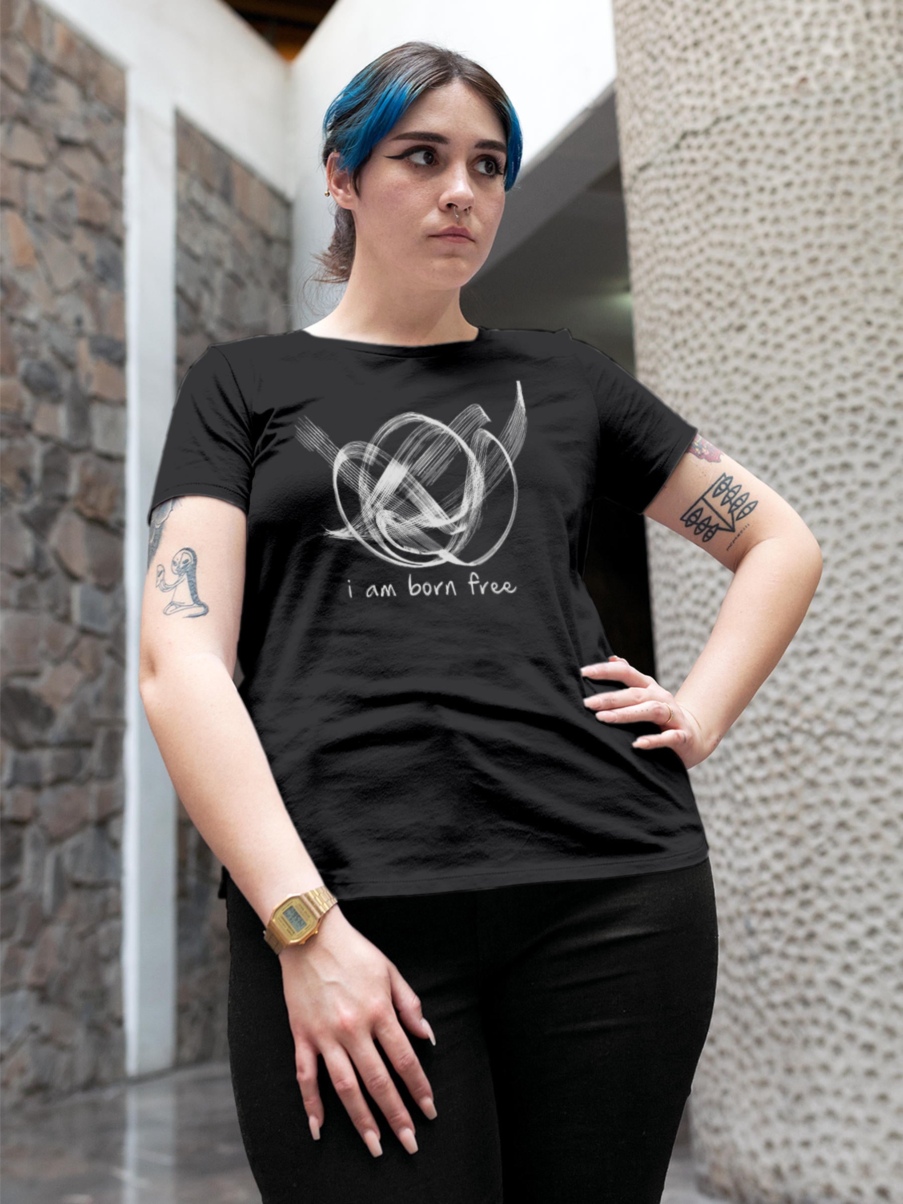 Model wearing Women's Dark Grey Round Neck T-shirt with 'Born Free' design, offering effortless style and premium comfort