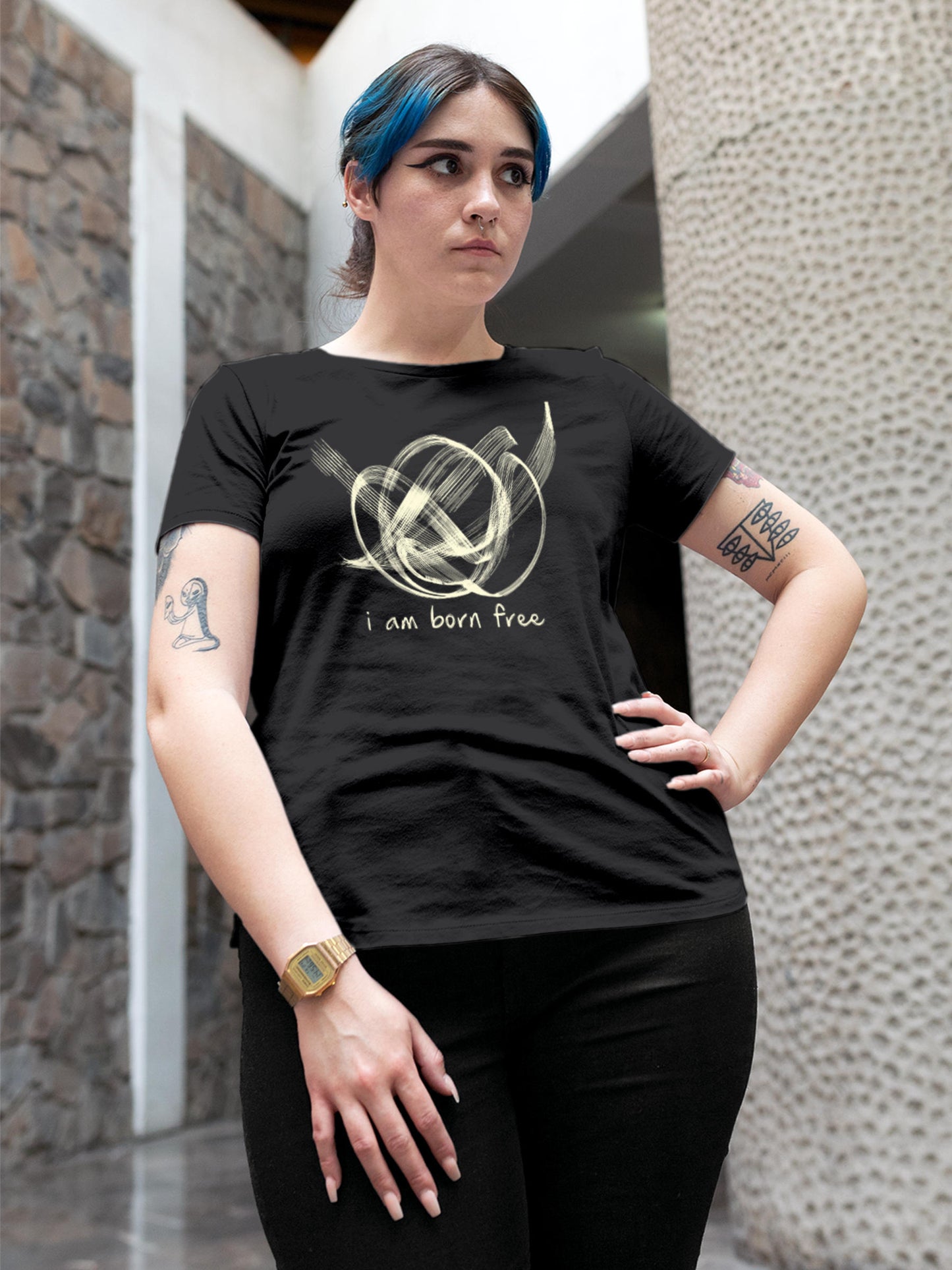 Model wearing Women's Dark Grey Round Neck T-shirt with 'Born Free' design, offering effortless style and premium comfort