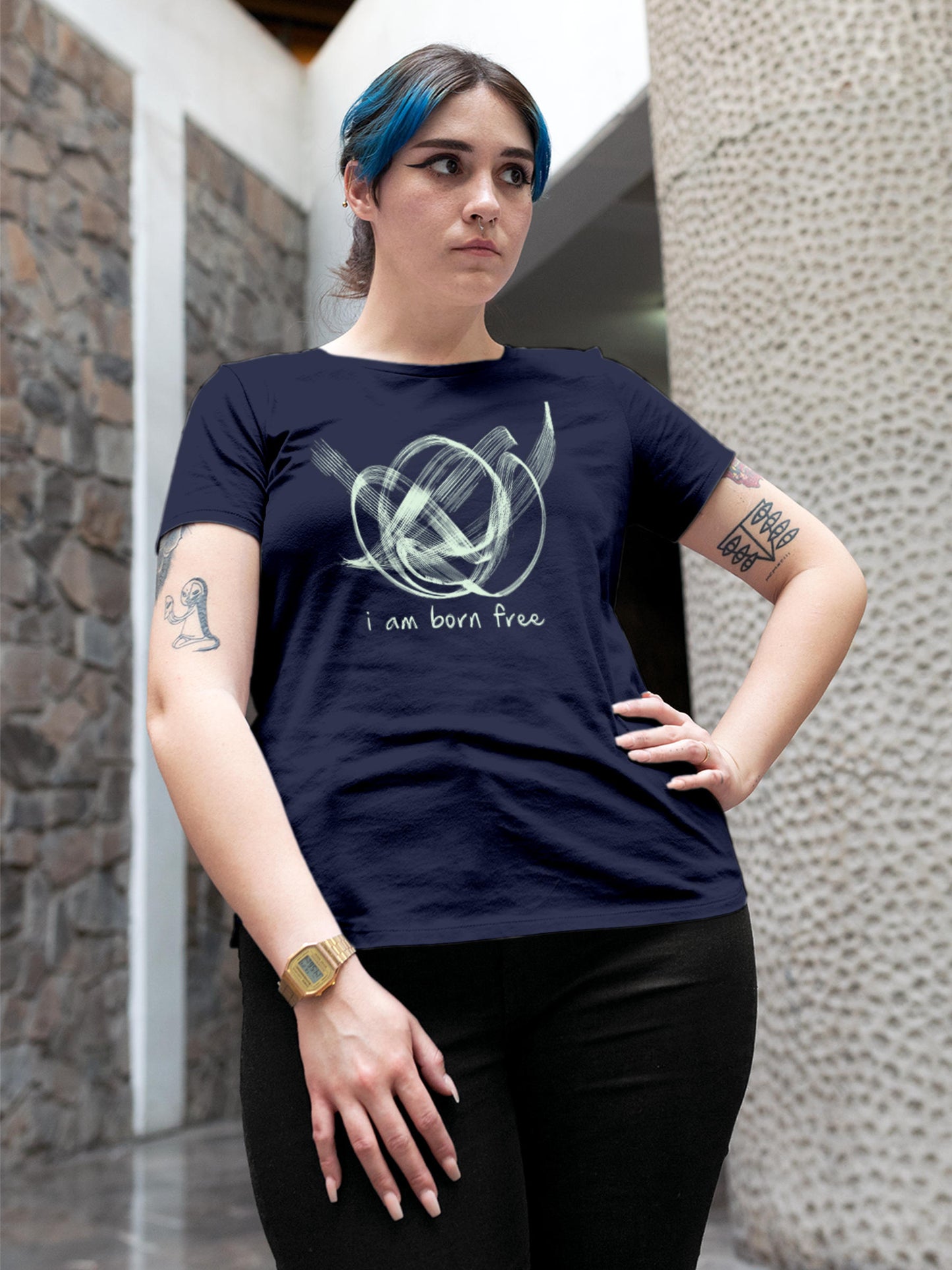 Model wearing Women's Navy Blue Round Neck T-shirt with 'Born Free' design, offering effortless style and premium comfort