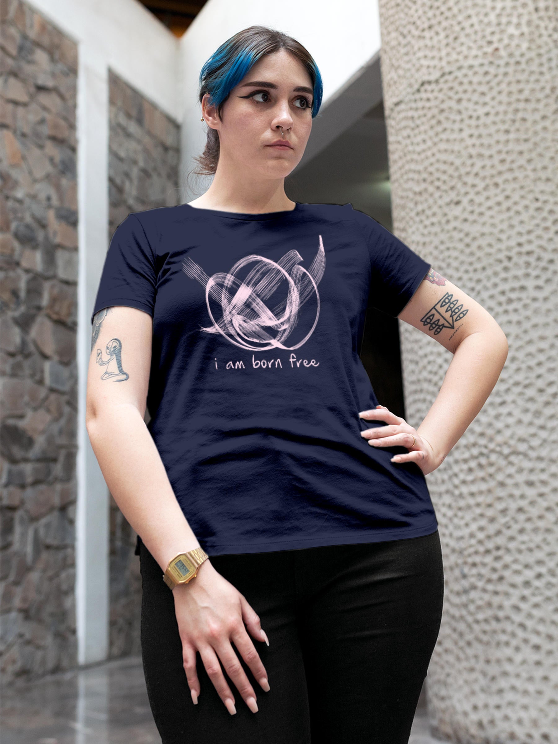 Model wearing Women's Navy Blue Round Neck T-shirt with 'Born Free' design, offering effortless style and premium comfort