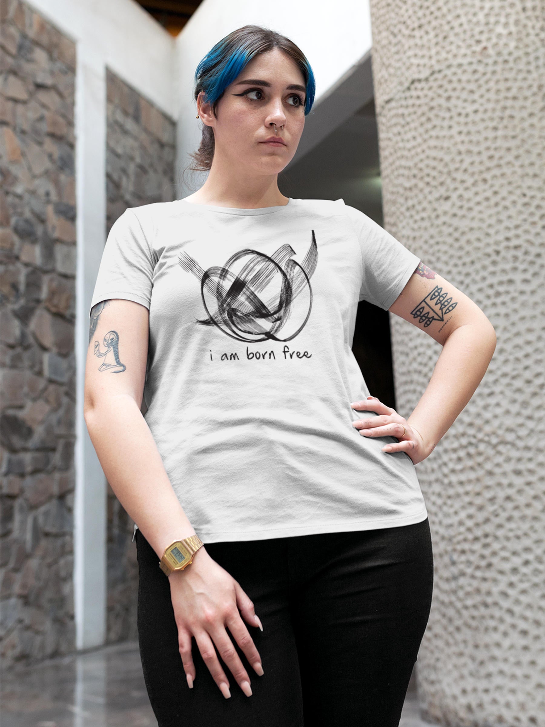 Model wearing Women's White Round Neck T-shirt with 'Born Free' design, offering effortless style and premium comfort