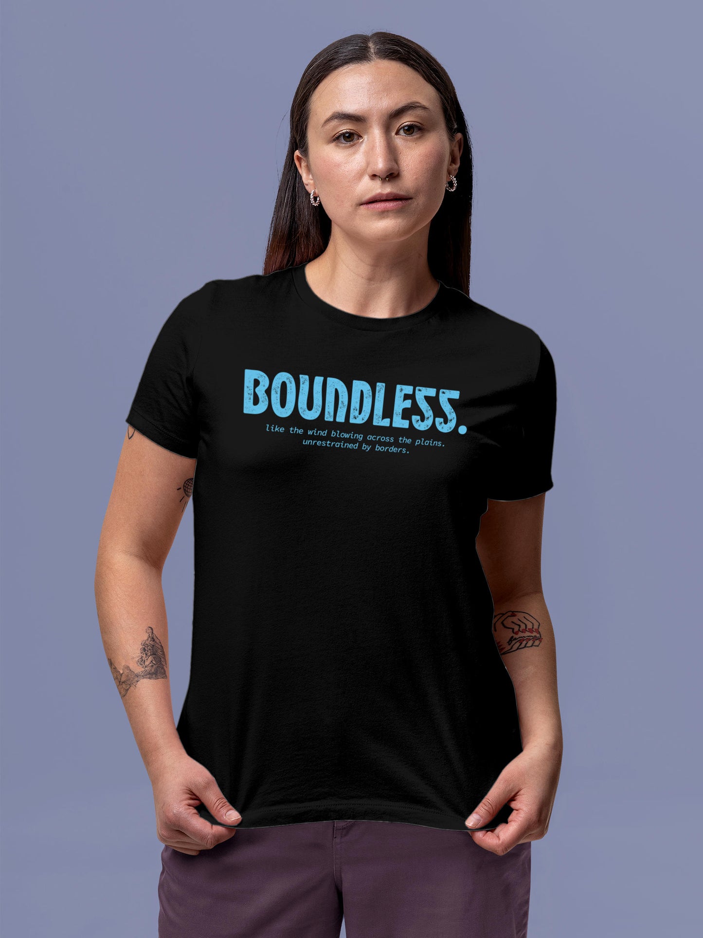 Model wearing Women's Black Round Neck T-shirt with 'Boundless' design, offering effortless style and premium comfort
