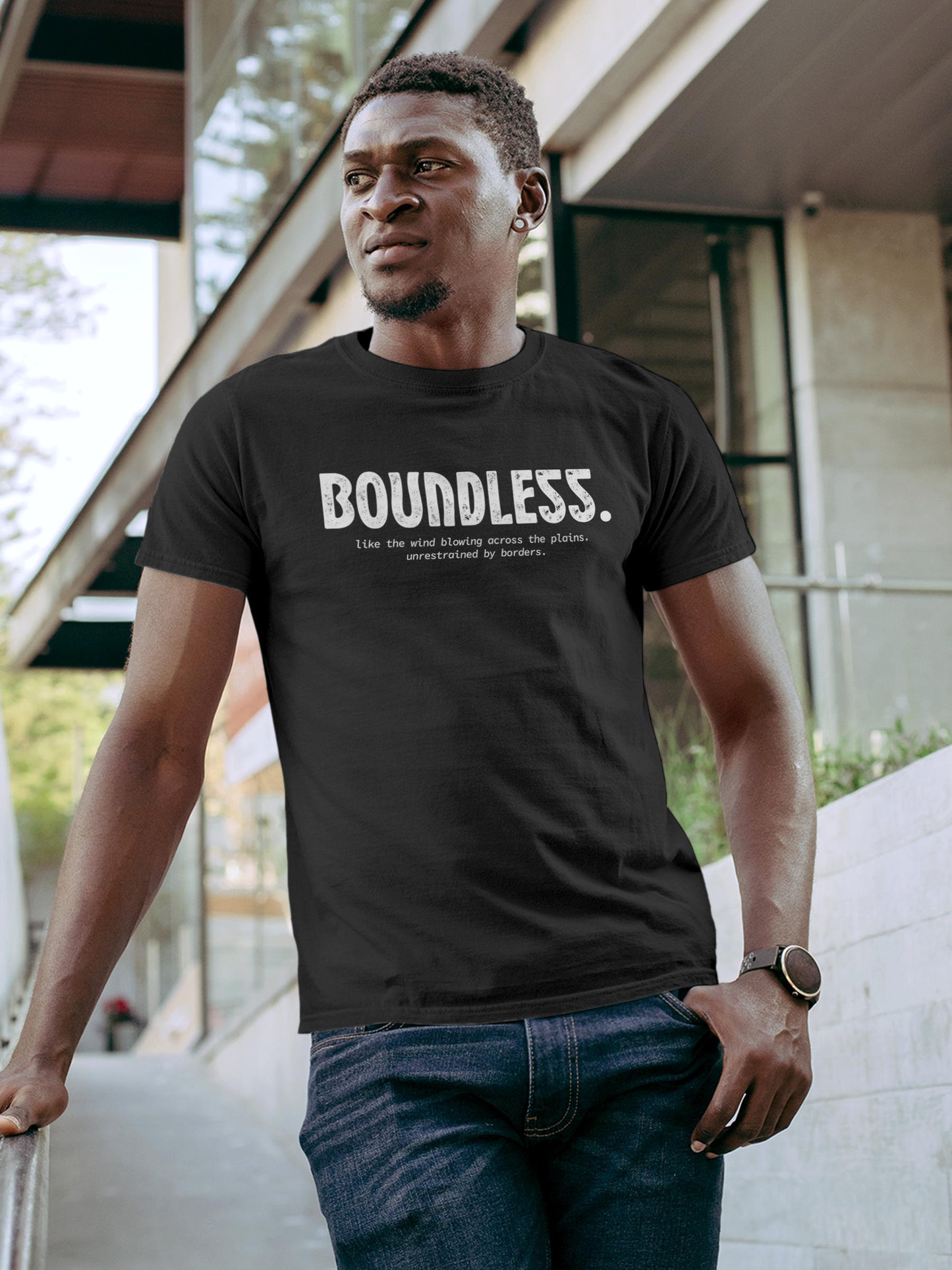 Model wearing Men's Dark Grey Round Neck T-shirt with 'Boundless' design, offering effortless style and premium comfort