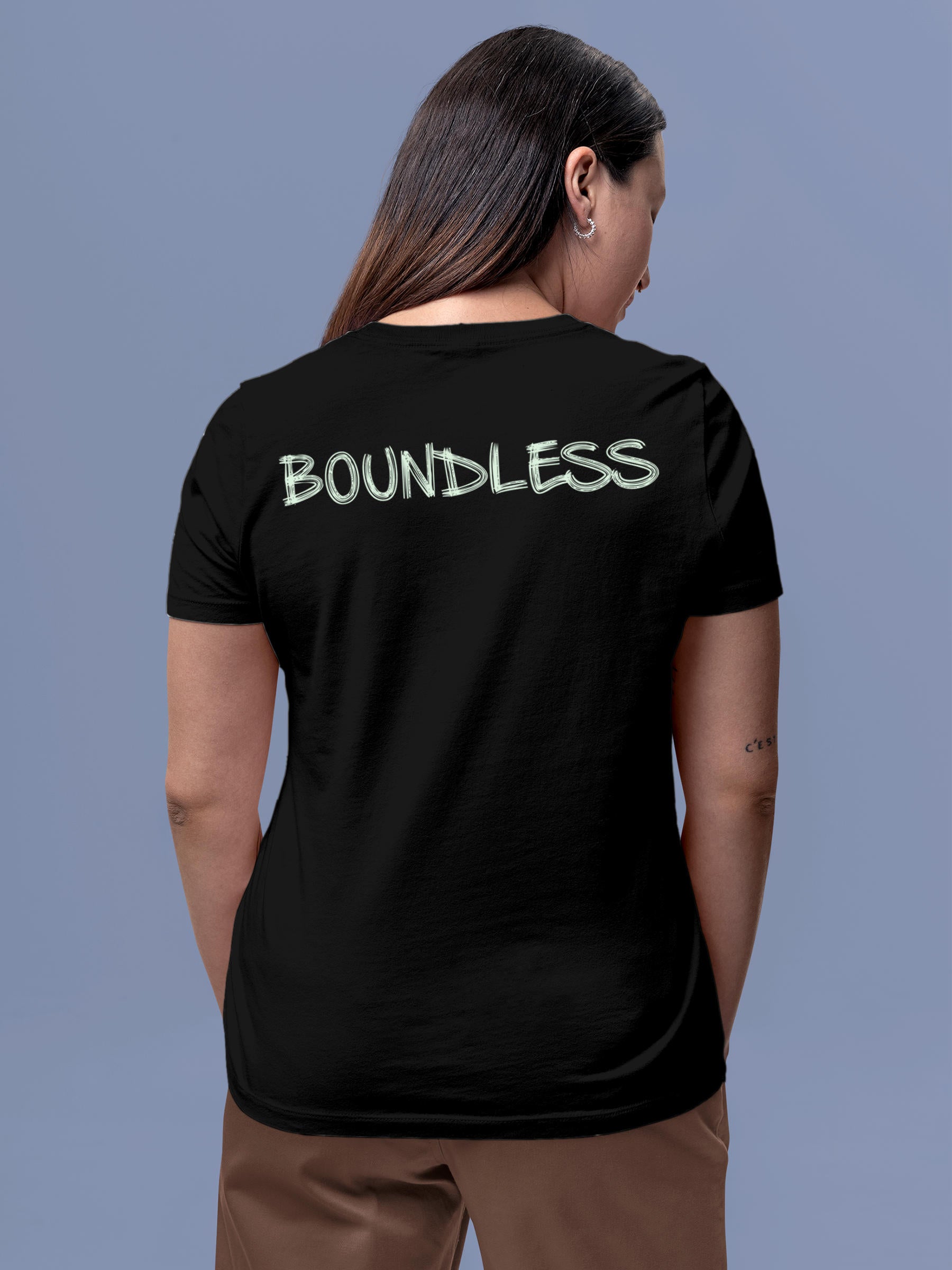 Model wearing Women's Black Round Neck T-shirt with 'Boundless' design, offering effortless style and premium comfort
