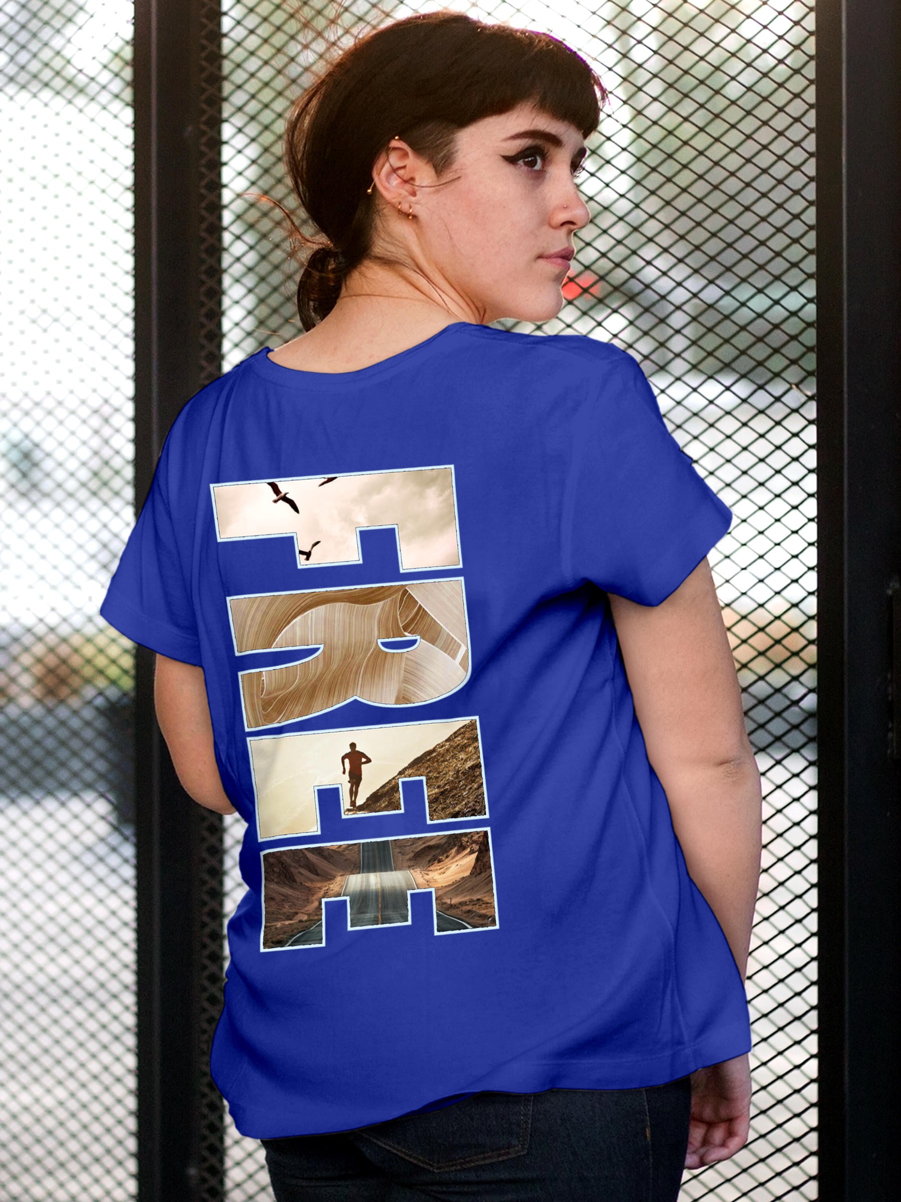 Model wearing Women's Blue Round Neck T-shirt with 'Free & Boundless' design, offering effortless style and premium comfort