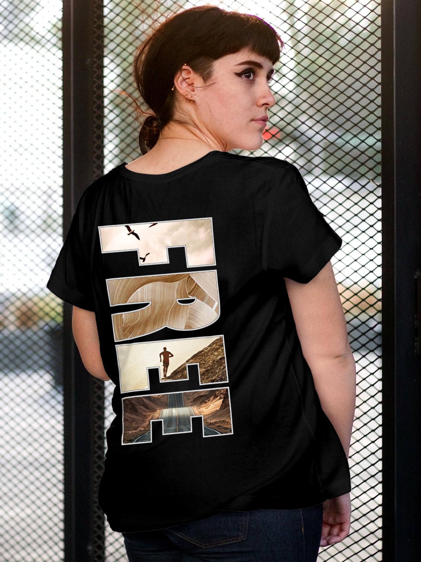 Model wearing Women's Black Round Neck T-shirt with 'Free & Boundless' design, offering effortless style and premium comfort