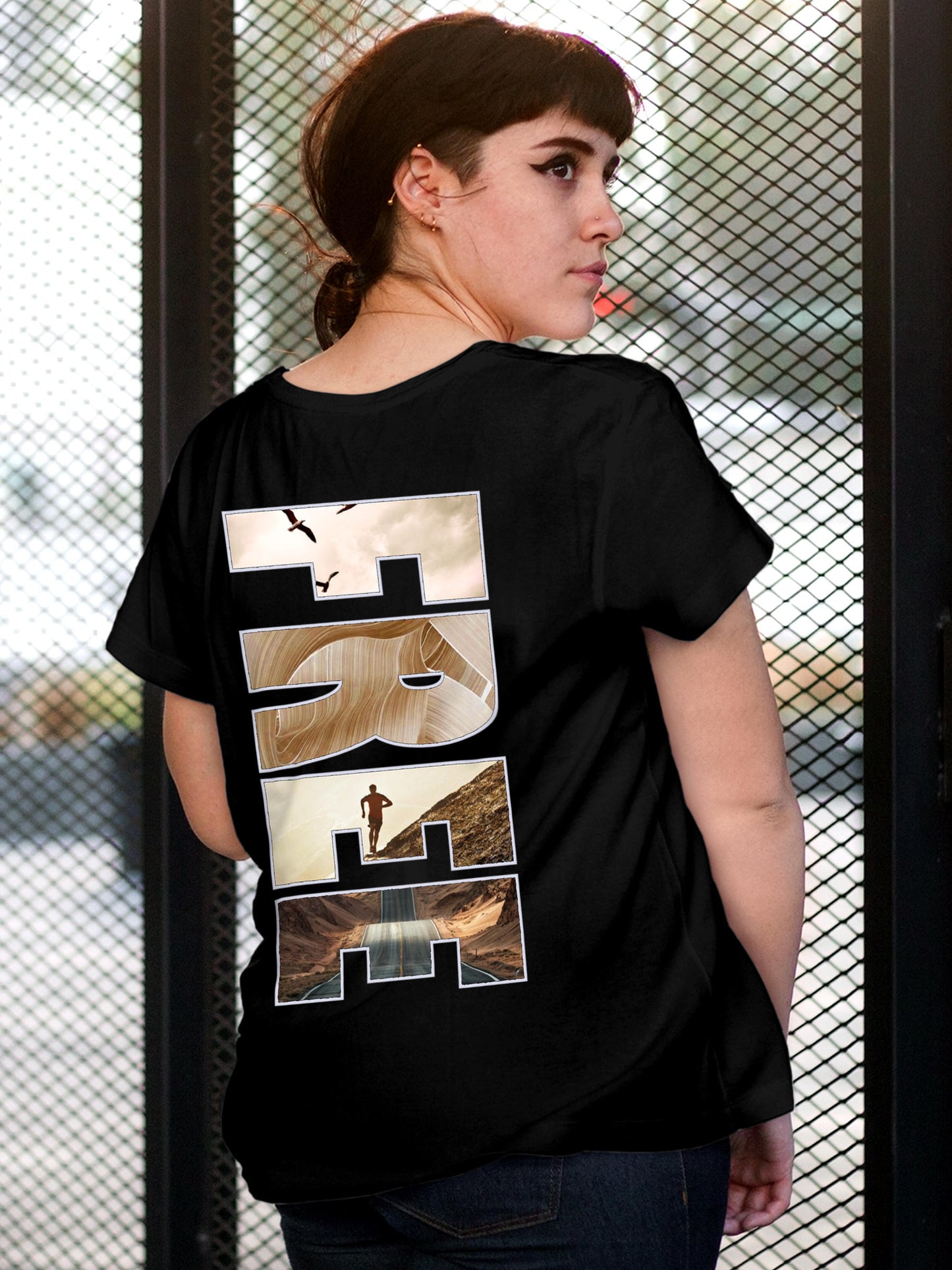 Model wearing Women's Black Round Neck T-shirt with 'Free & Boundless' design, offering effortless style and premium comfort