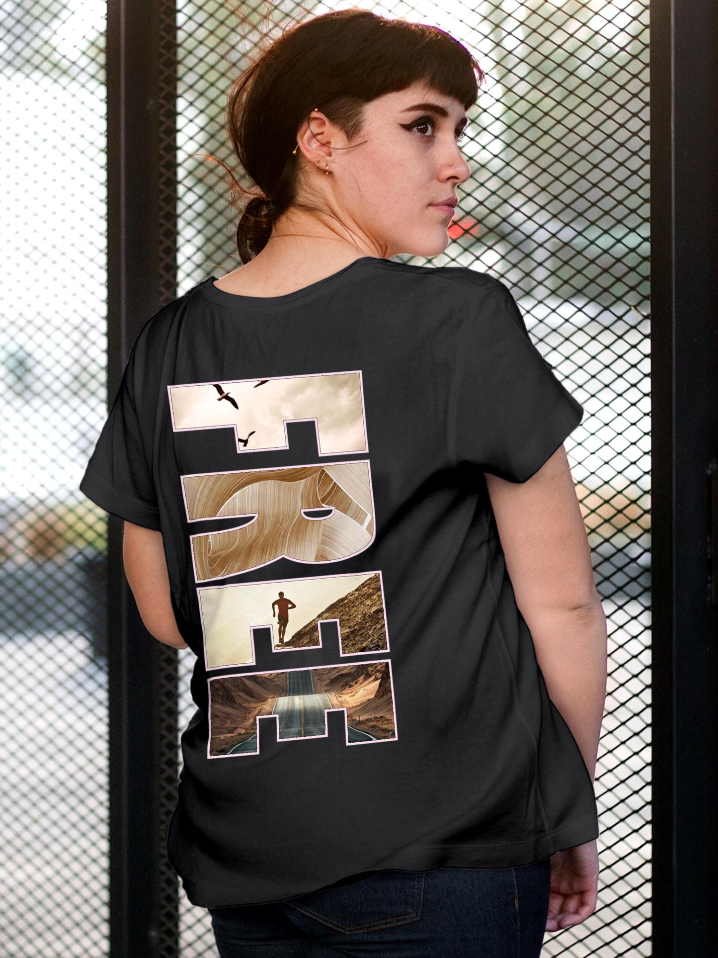 Model wearing Women's Dark Grey Round Neck T-shirt with 'Free & Boundless' design, offering effortless style and premium comfort