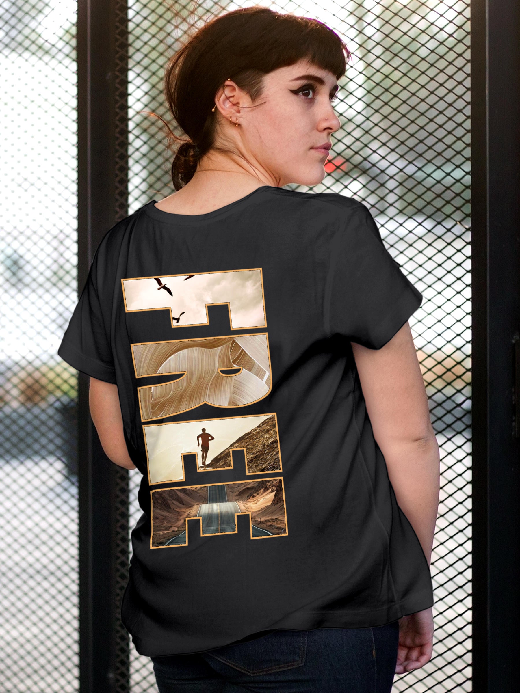 Model wearing Women's Dark Grey Round Neck T-shirt with 'Free & Boundless' design, offering effortless style and premium comfort