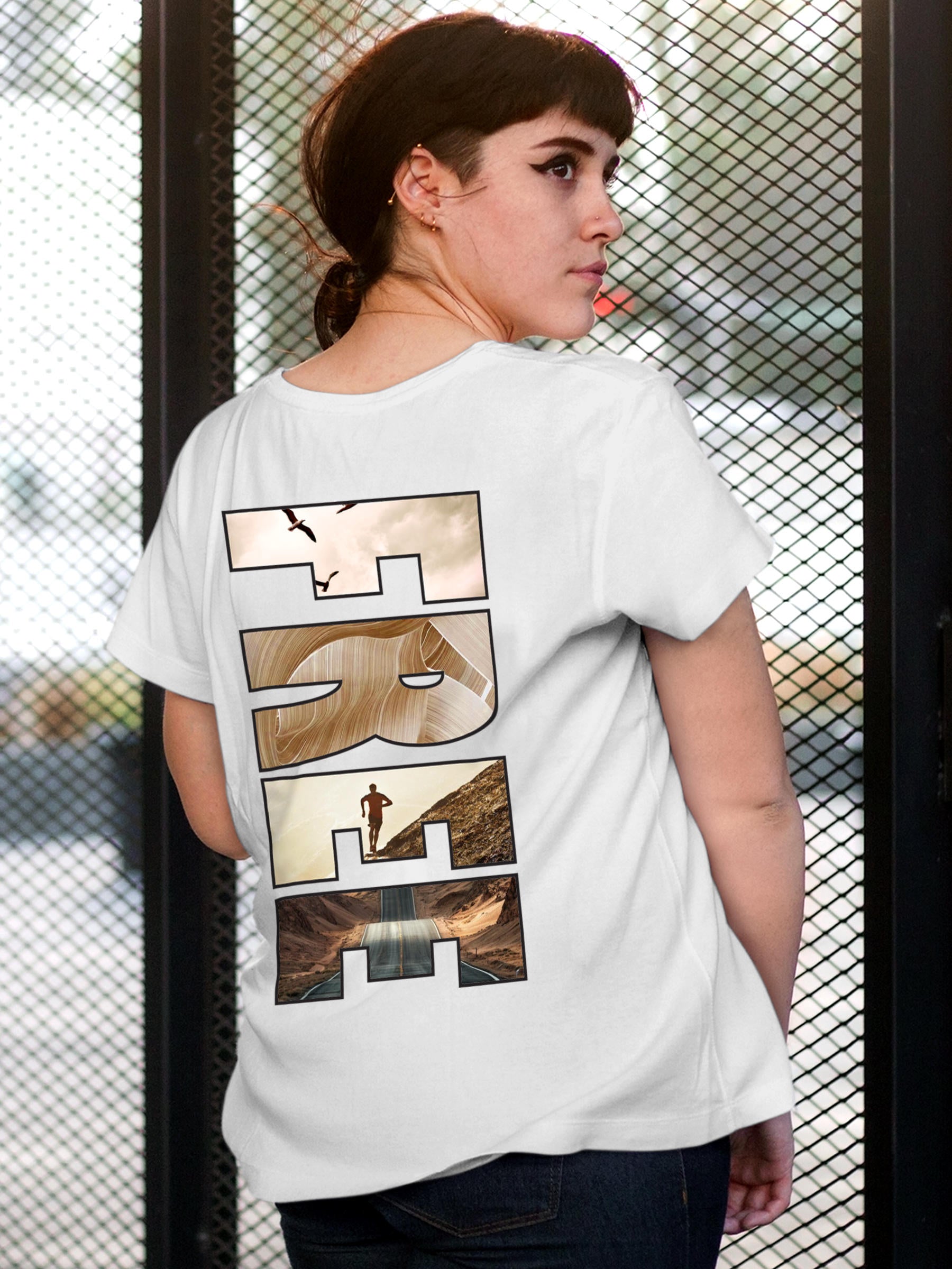 Model wearing Women's White Round Neck T-shirt with 'Free & Boundless' design, offering effortless style and premium comfort