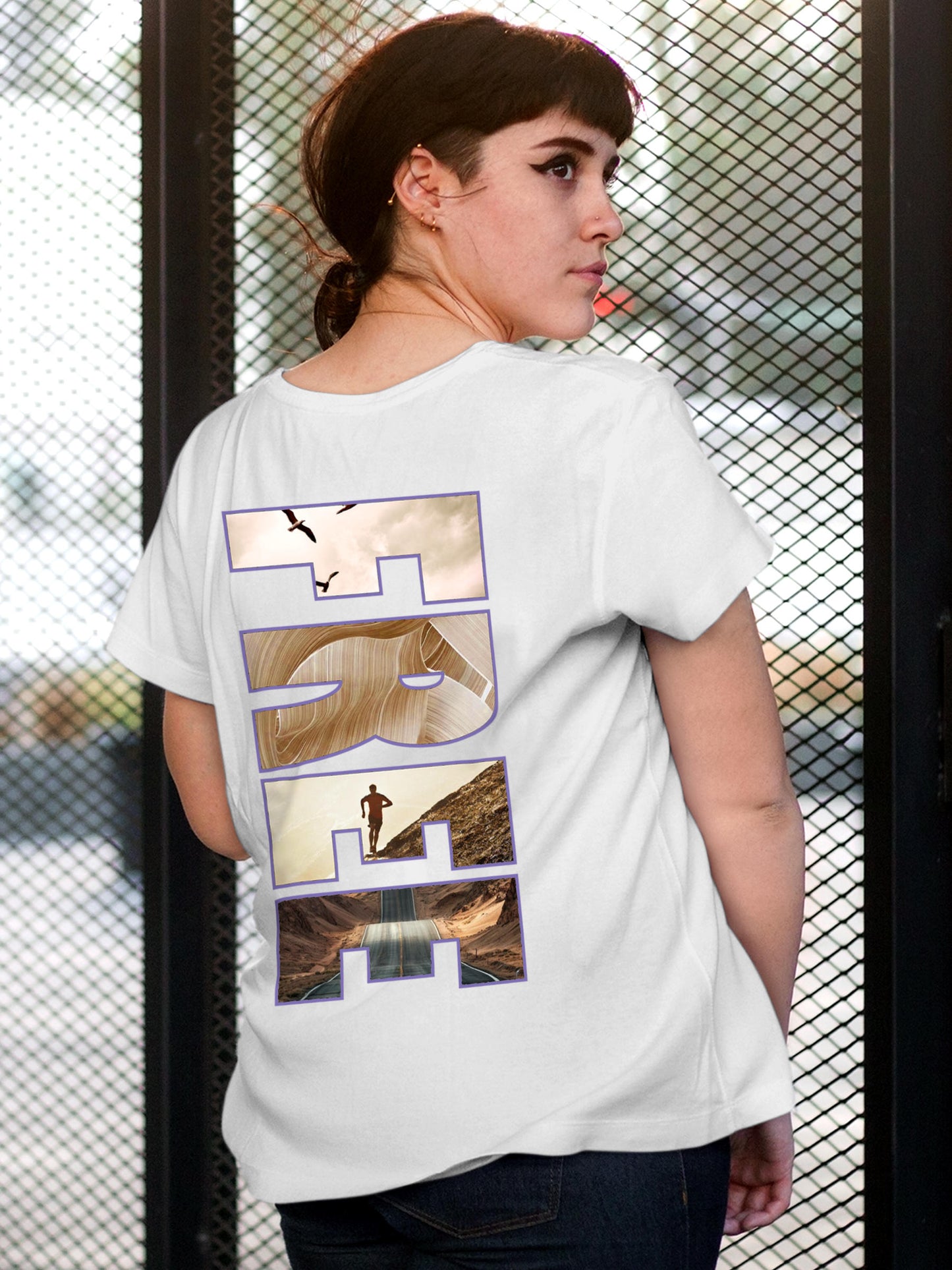 Model wearing Women's White Round Neck T-shirt with 'Free & Boundless' design, offering effortless style and premium comfort