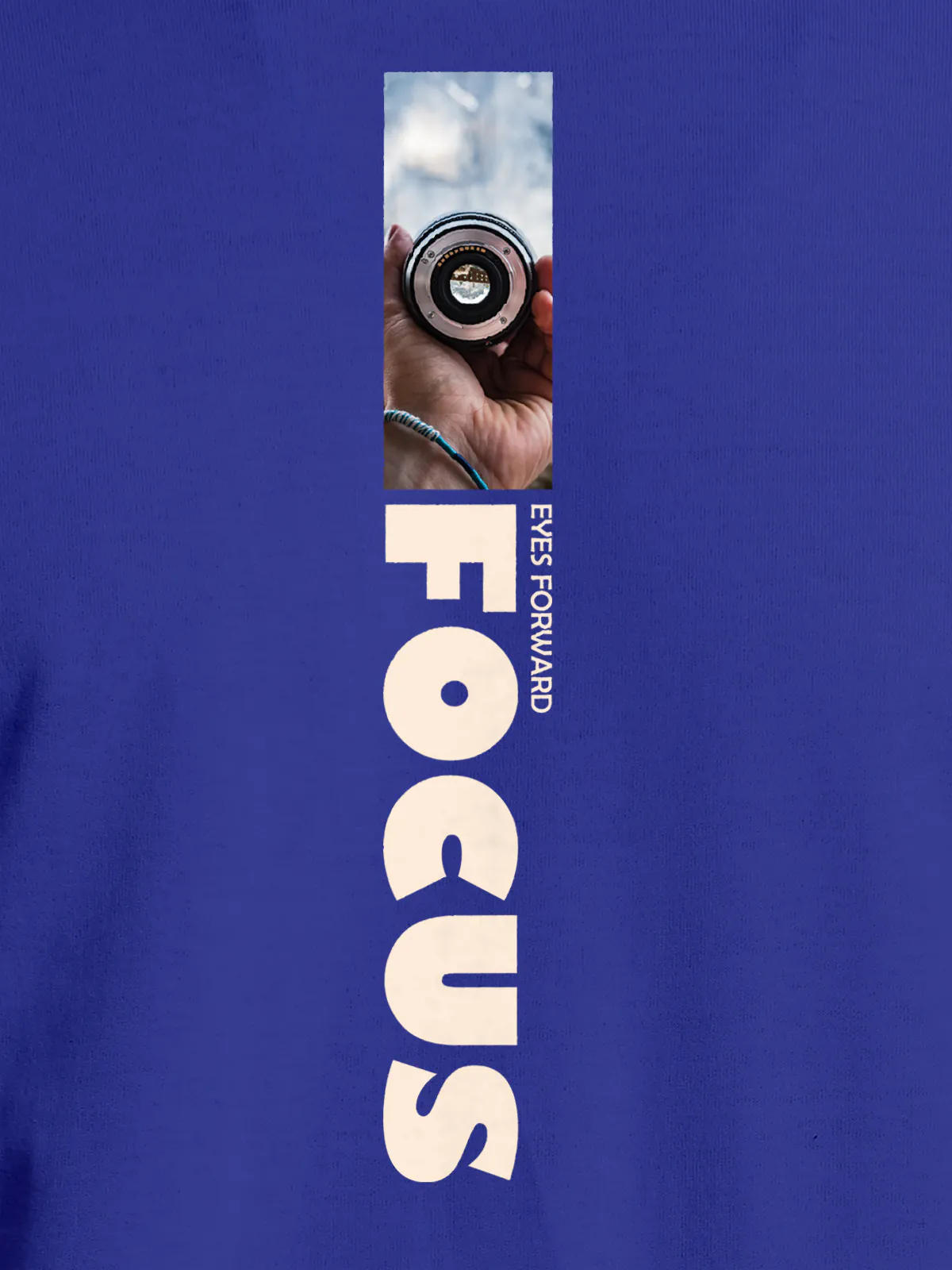 Close up of 'Focus' design on Men's Blue Round Neck T-shirt, highlighting intricate details and vibrant print.