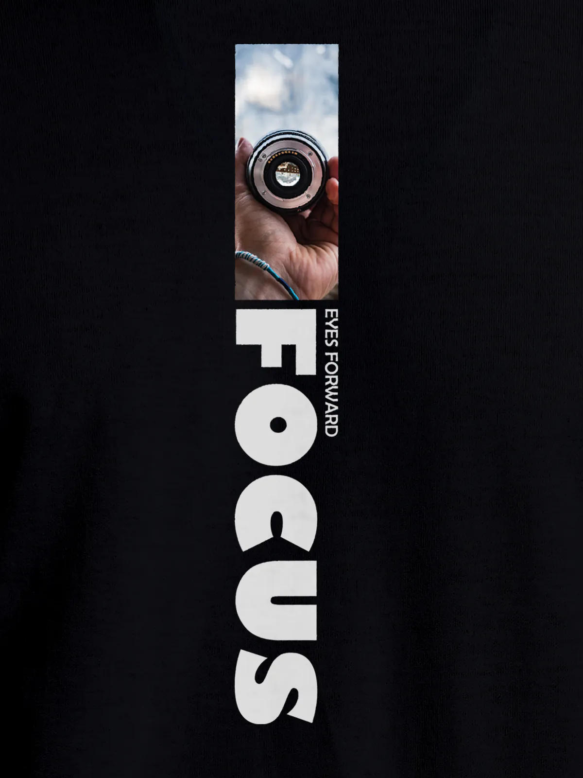 Close up of 'Focus' design on Men's Black Round Neck T-shirt, highlighting intricate details and vibrant print.