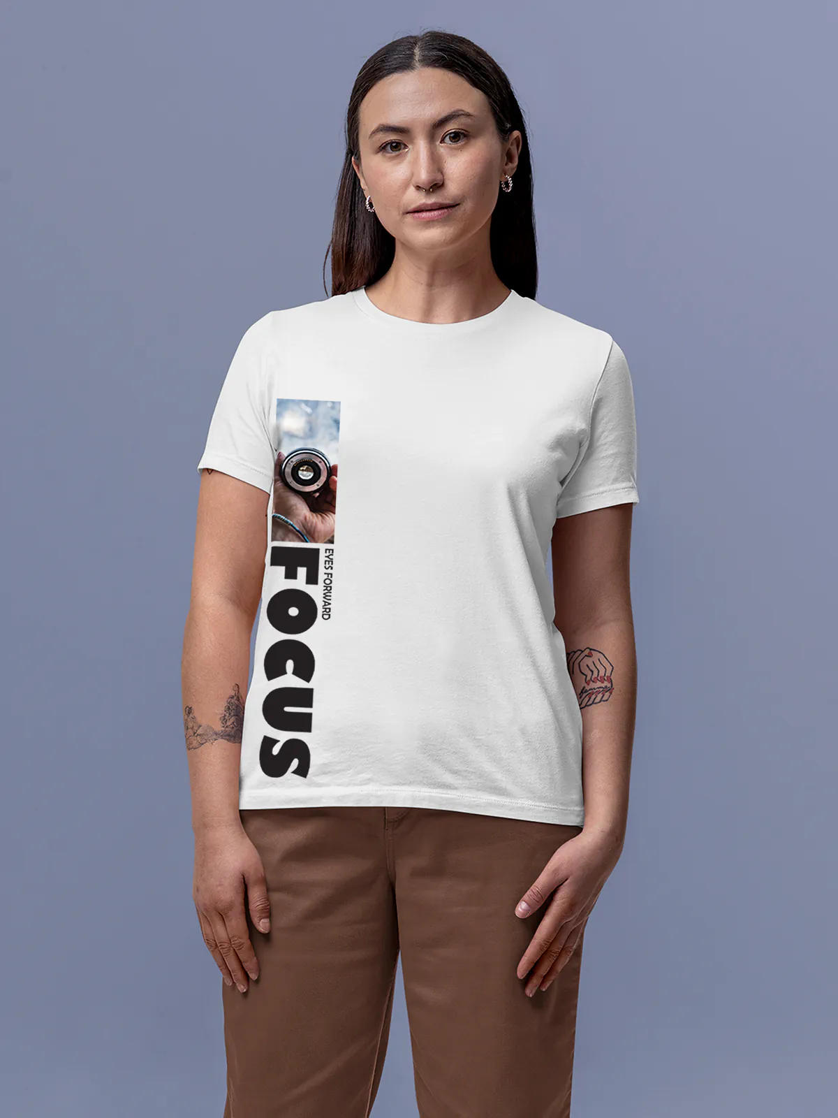 Model wearing Women's White Round Neck T-shirt with 'Focus' design, offering effortless style and premium comfort