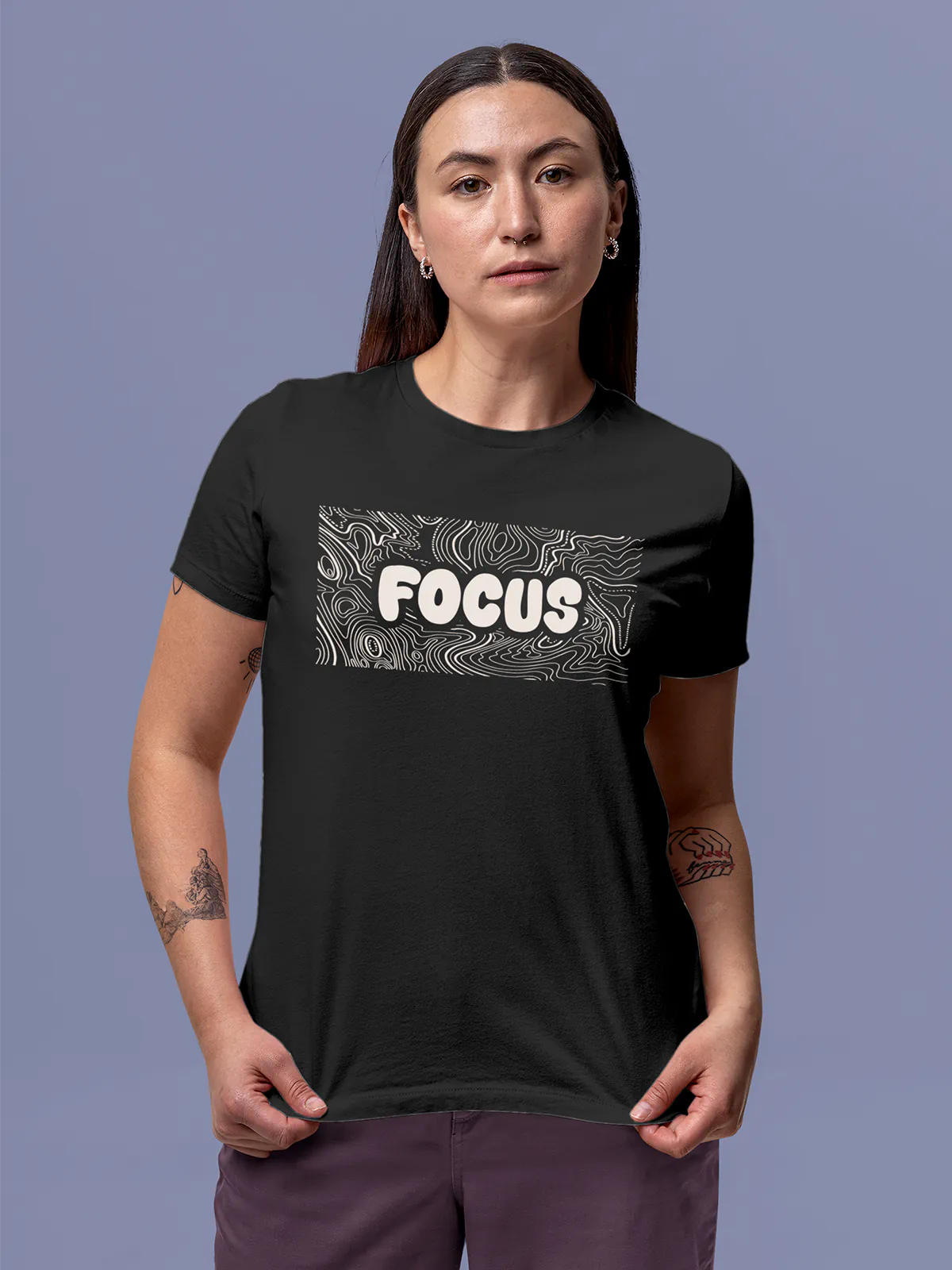 Model wearing Women's Dark Grey Round Neck T-shirt with 'Focus In Chaos' design, offering effortless style and premium comfort