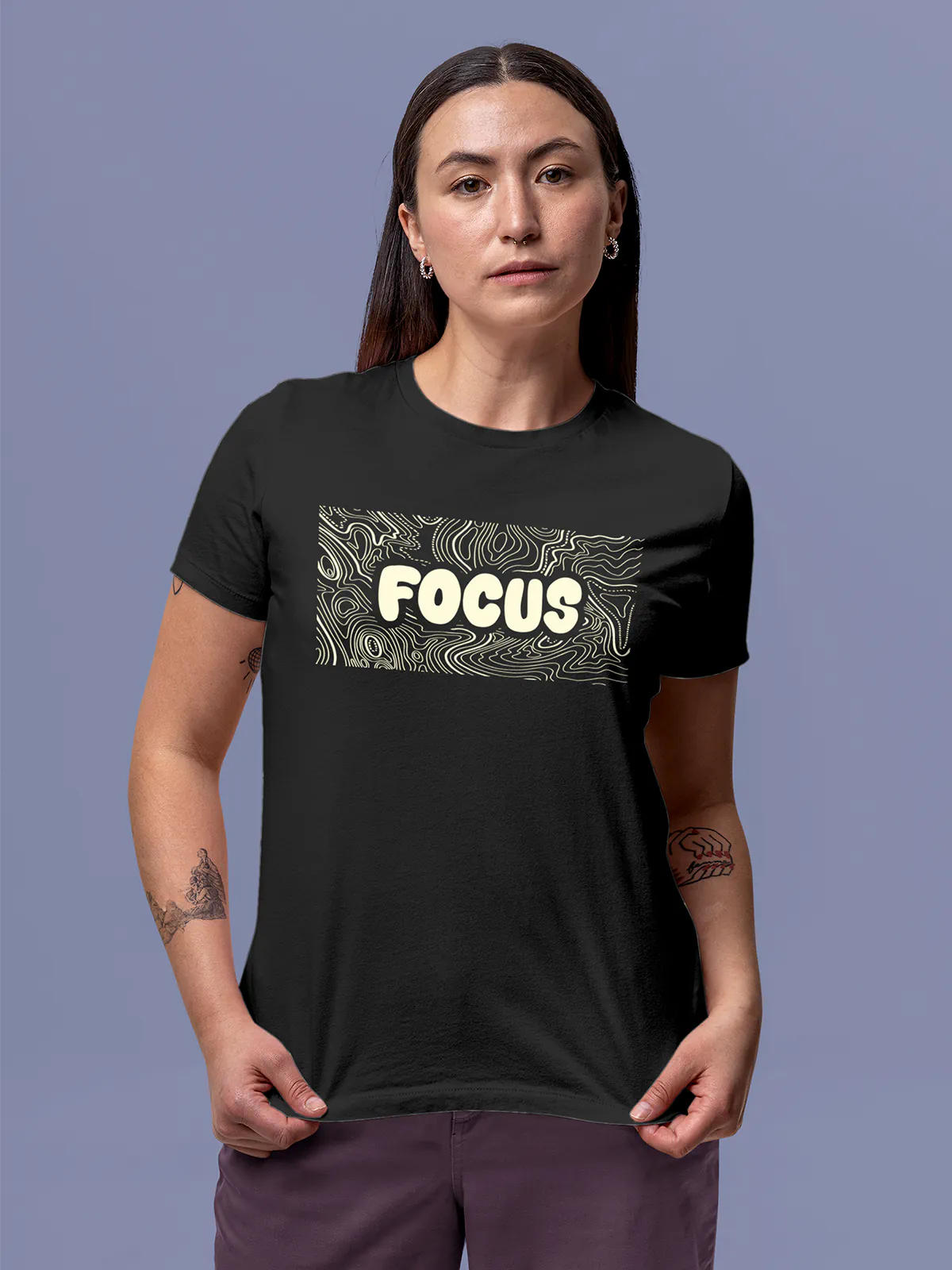 Model wearing Women's Dark Grey Round Neck T-shirt with 'Focus In Chaos' design, offering effortless style and premium comfort