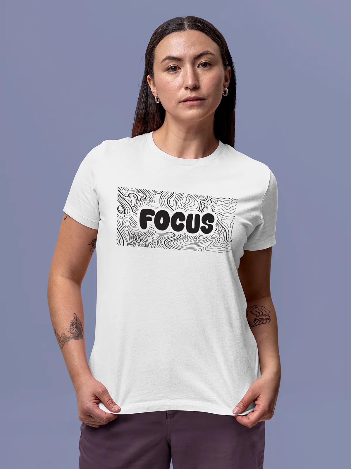 Model wearing Women's White Round Neck T-shirt with 'Focus In Chaos' design, offering effortless style and premium comfort