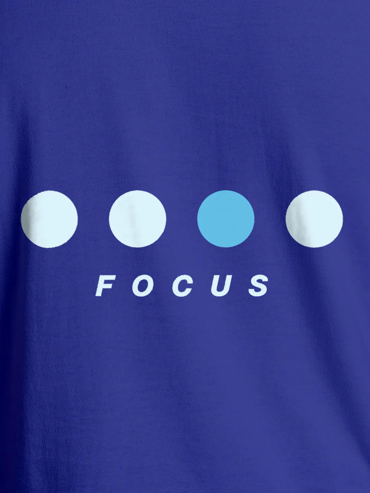 Close up of 'Focus On Goal' design on Women's Blue Round Neck T-shirt, highlighting intricate details and vibrant print.