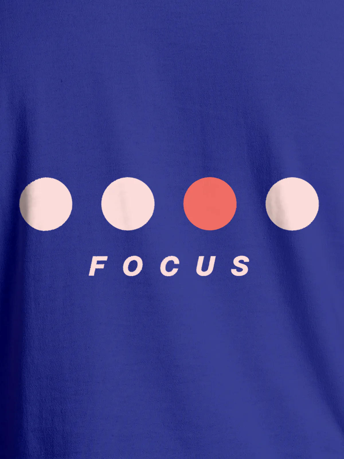 Close up of 'Focus On Goal' design on Women's Blue Round Neck T-shirt, highlighting intricate details and vibrant print.