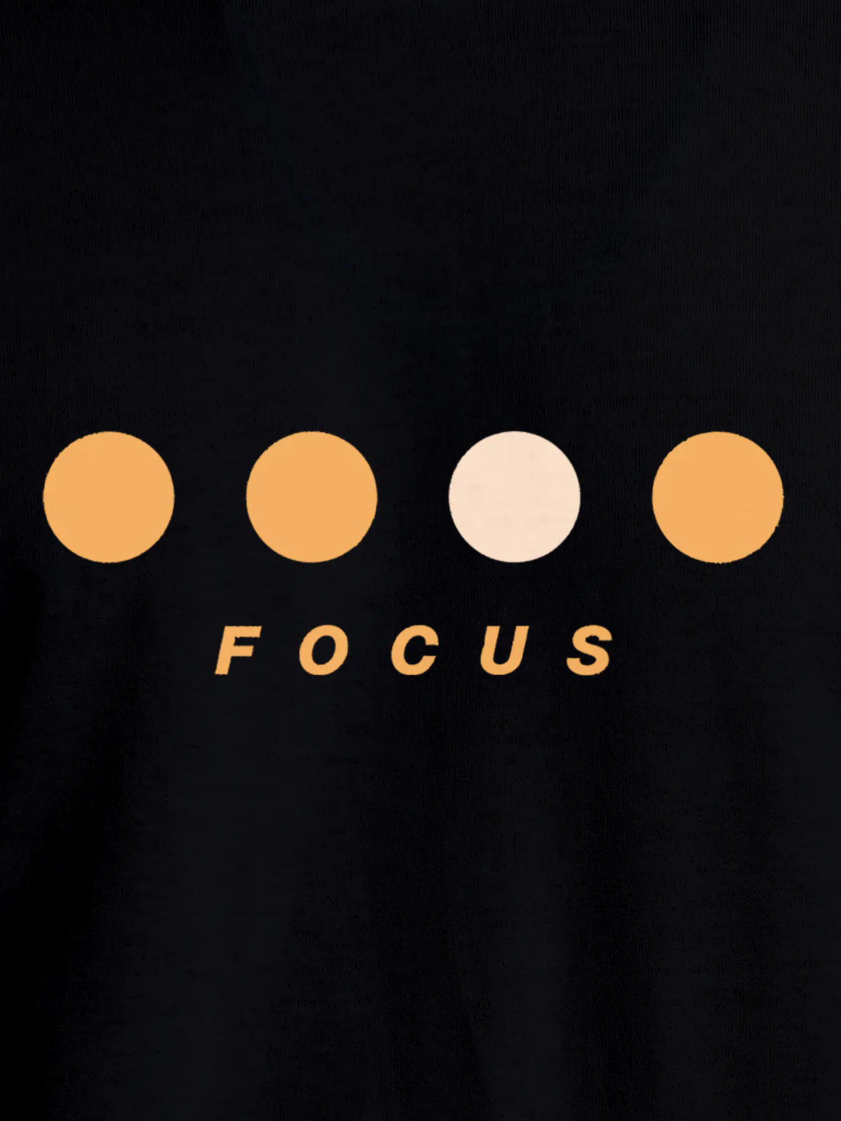 Close up of 'Focus On Goal' design on Men's Black Round Neck T-shirt, highlighting intricate details and vibrant print.