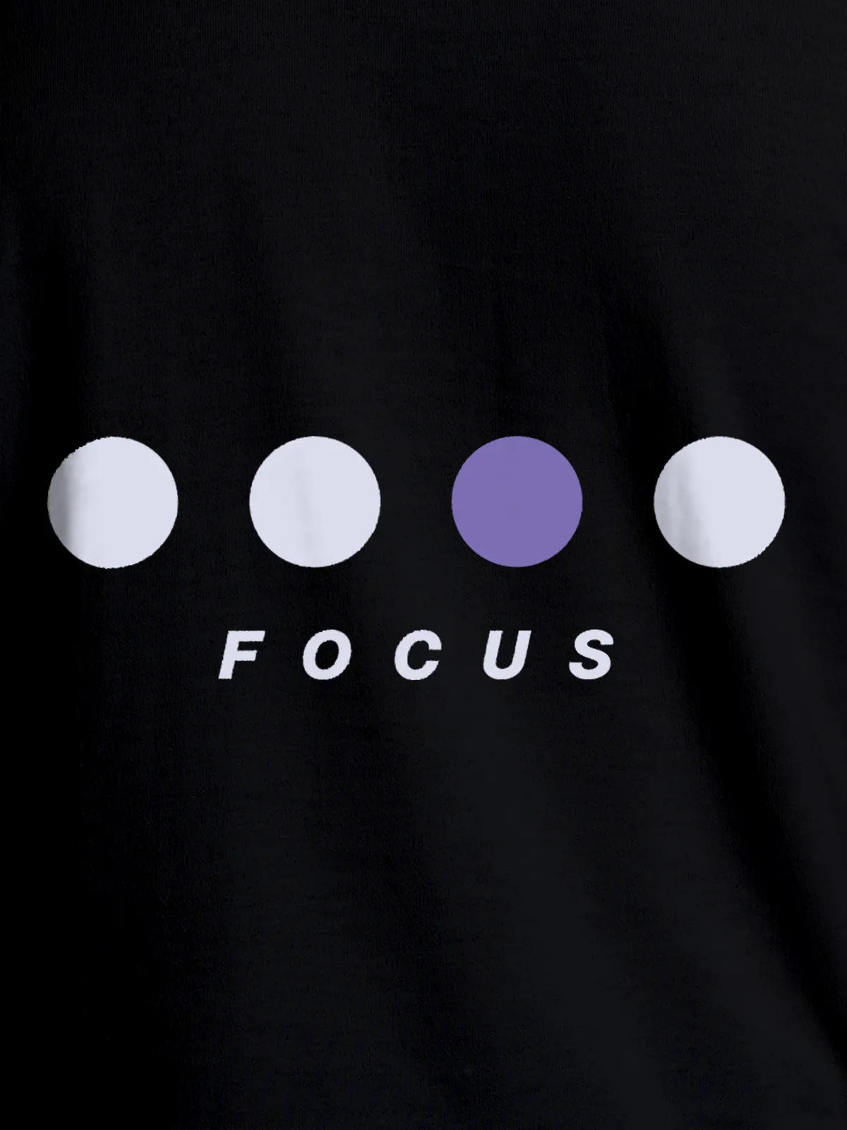Close up of 'Focus On Goal' design on Women's Black Round Neck T-shirt, highlighting intricate details and vibrant print.