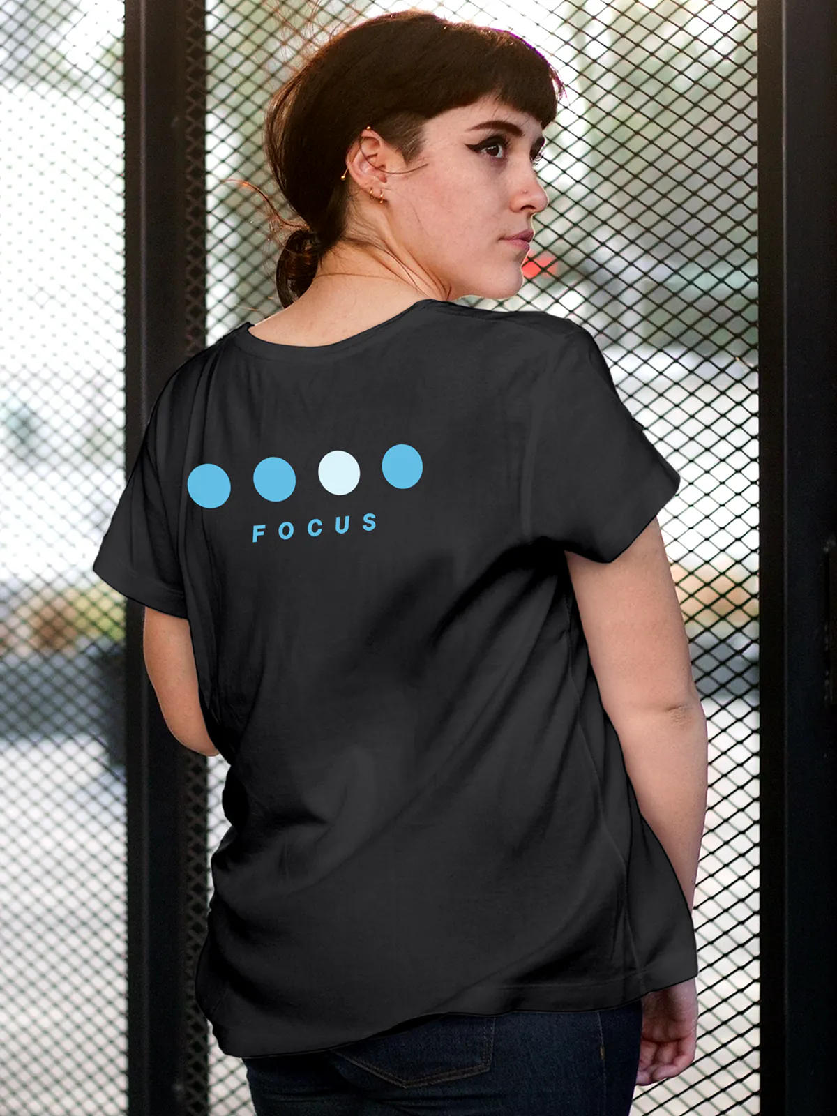 Model wearing Women's Dark Grey Round Neck T-shirt with 'Focus On Goal' design, offering effortless style and premium comfort