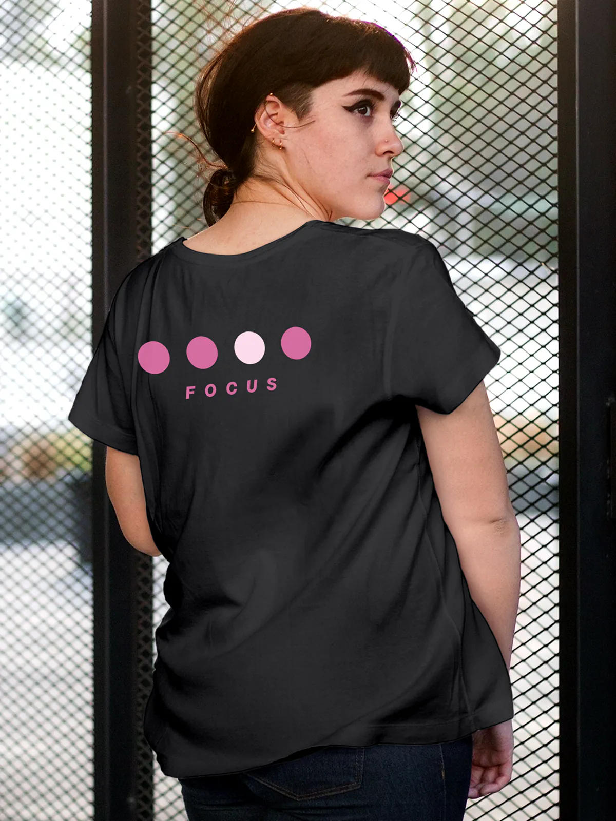 Model wearing Women's Dark Grey Round Neck T-shirt with 'Focus On Goal' design, offering effortless style and premium comfort