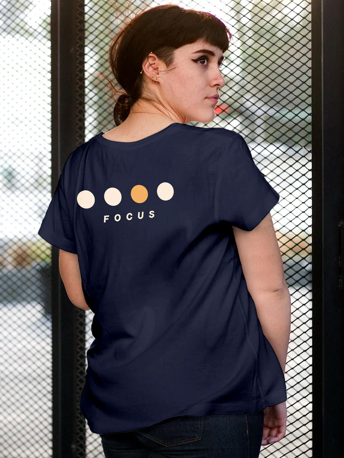 Model wearing Women's Navy Blue Round Neck T-shirt with 'Focus On Goal' design, offering effortless style and premium comfort