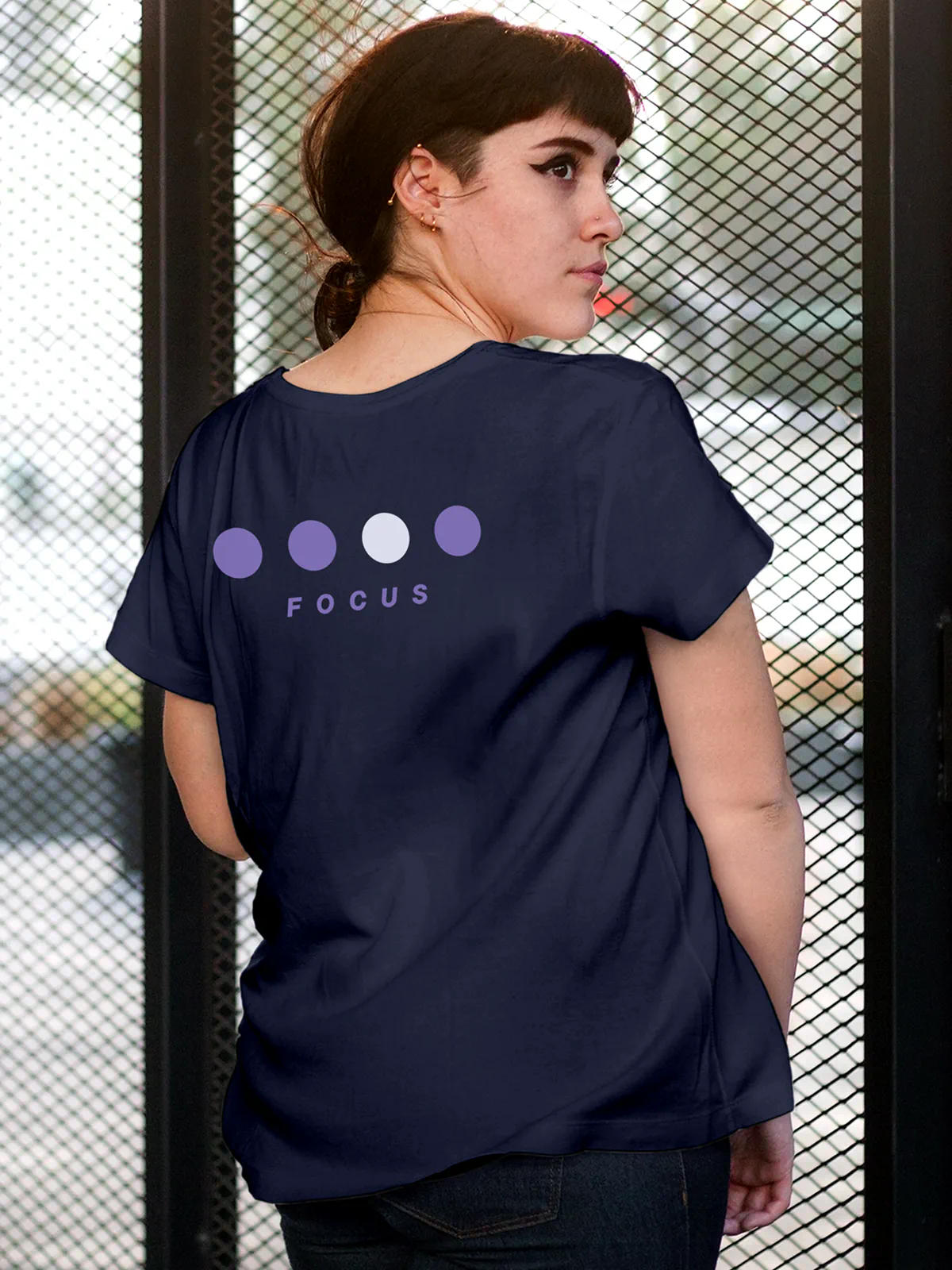 Model wearing Women's Navy Blue Round Neck T-shirt with 'Focus On Goal' design, offering effortless style and premium comfort