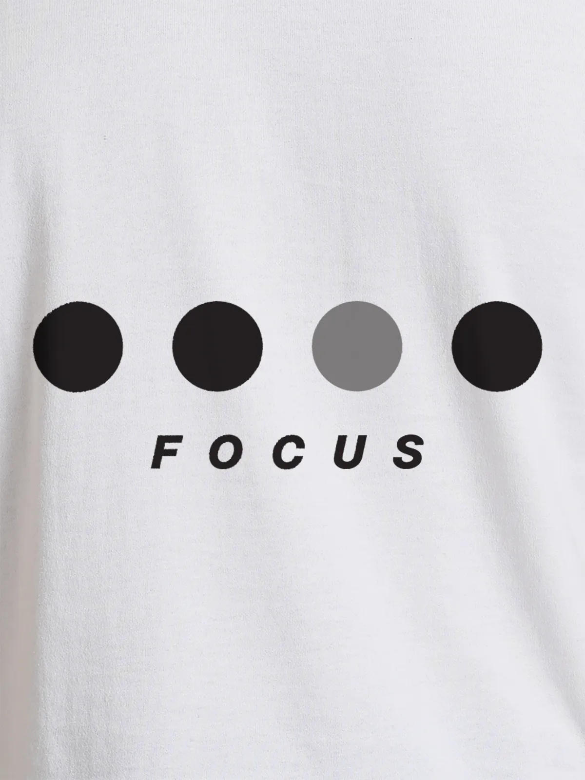 Close up of 'Focus On Goal' design on Women's White Round Neck T-shirt, highlighting intricate details and vibrant print.