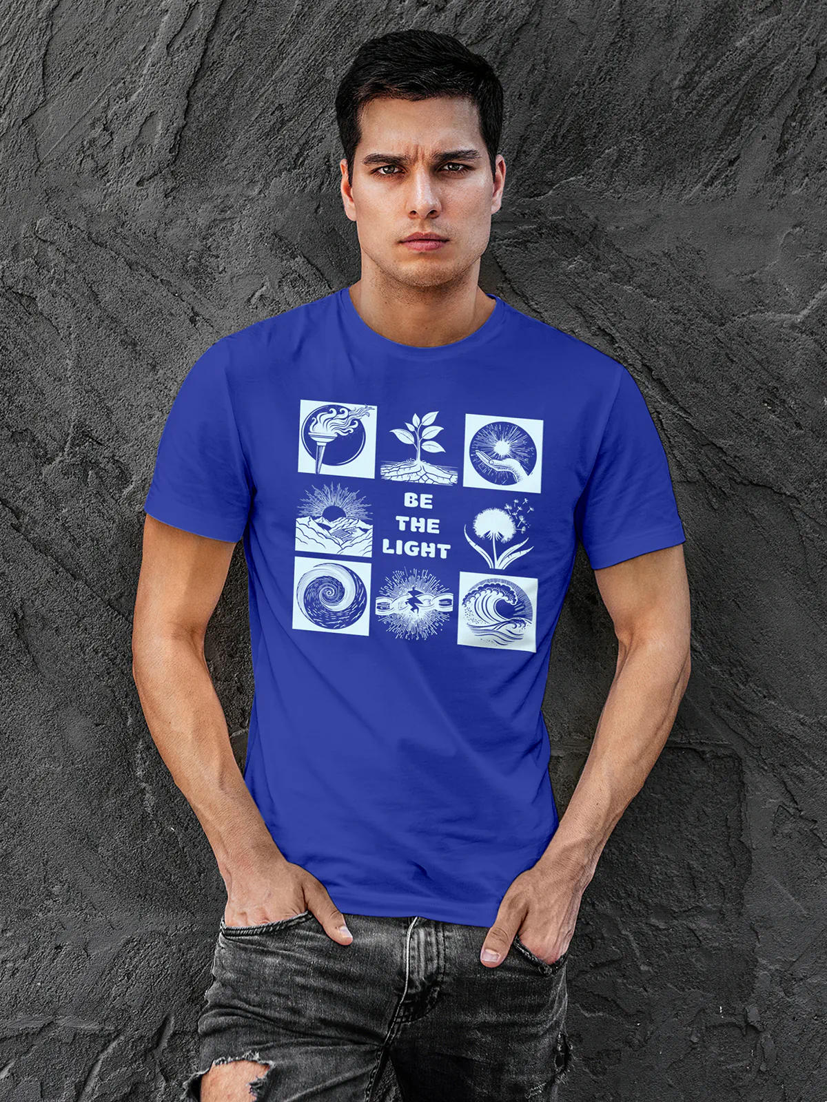 Model wearing Men's Blue Round Neck T-shirt with 'Be The Light' design, offering effortless style and premium comfort