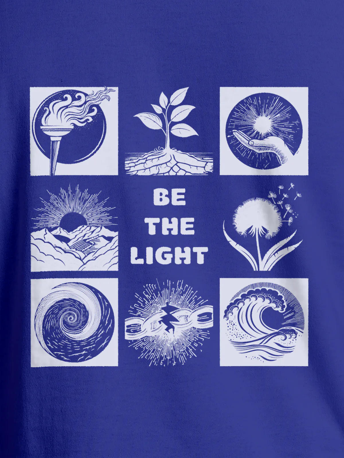 Close up of 'Be The Light' design on Men's Blue Round Neck T-shirt, highlighting intricate details and vibrant print.