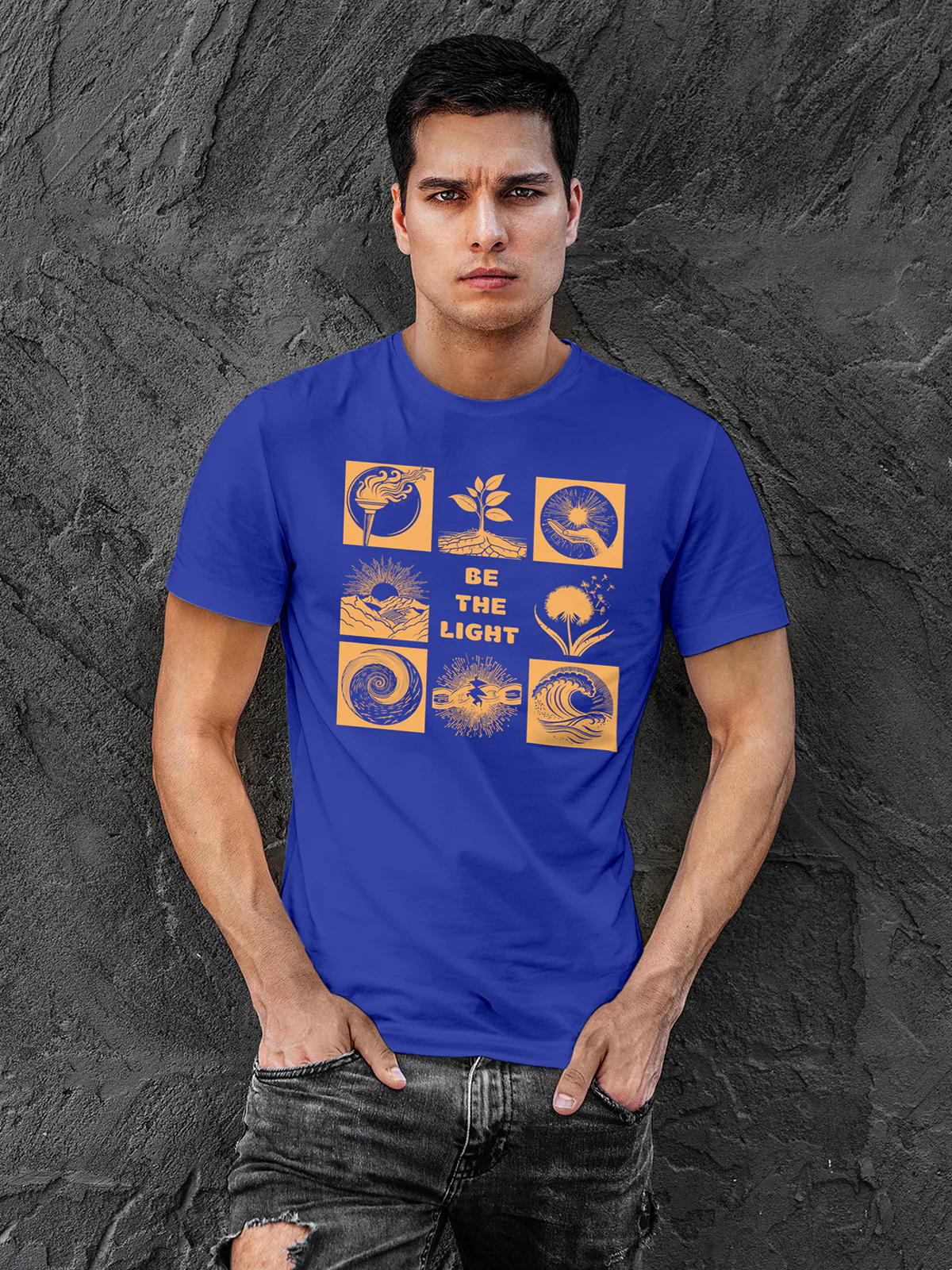 Model wearing Men's Blue Round Neck T-shirt with 'Be The Light' design, offering effortless style and premium comfort