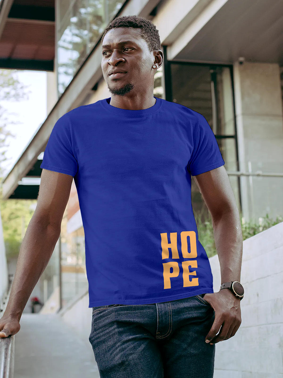 Model wearing Men's Blue Round Neck T-shirt with 'Hope' design, offering effortless style and premium comfort