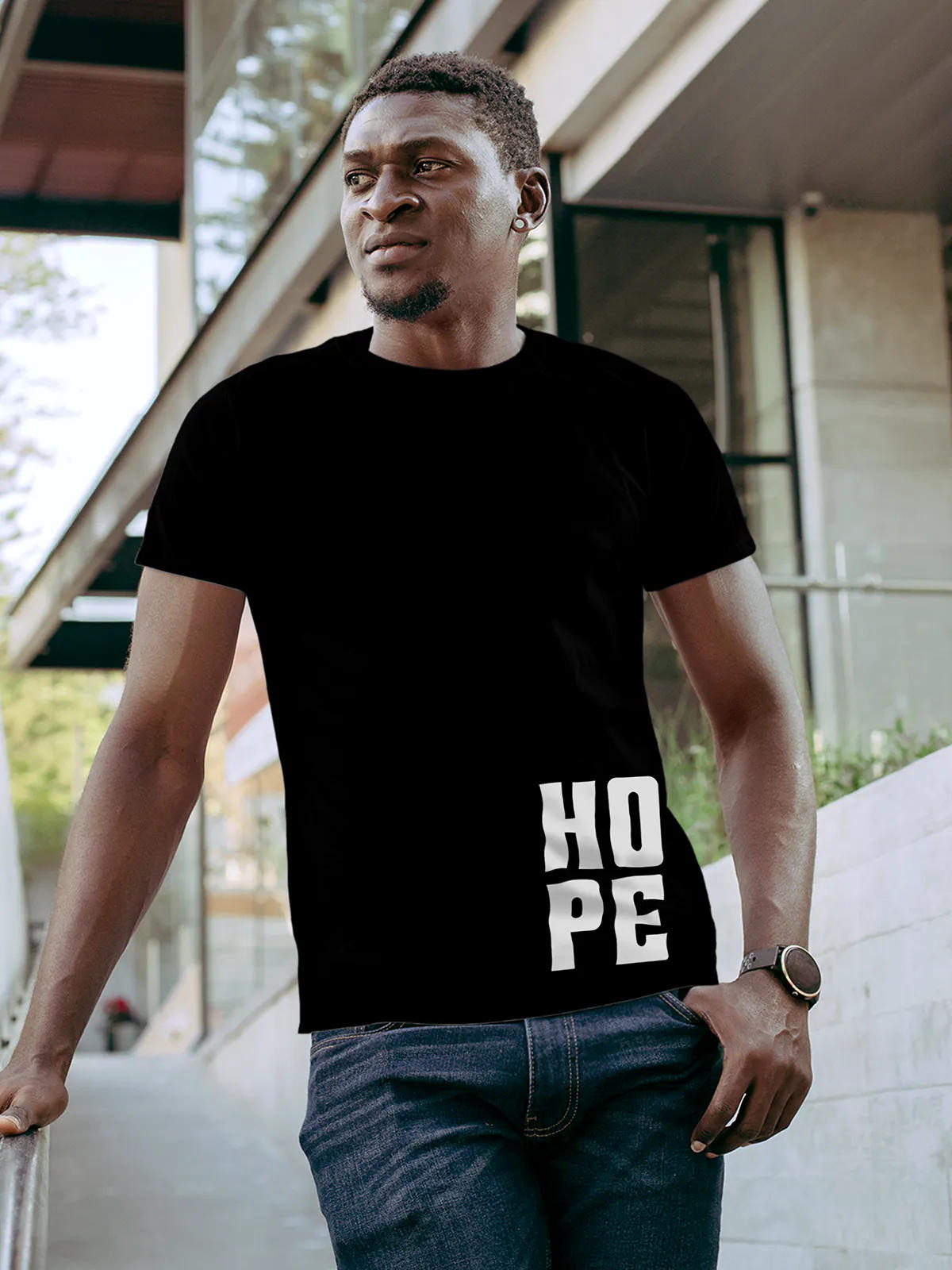Model wearing Men's Black Round Neck T-shirt with 'Hope' design, offering effortless style and premium comfort